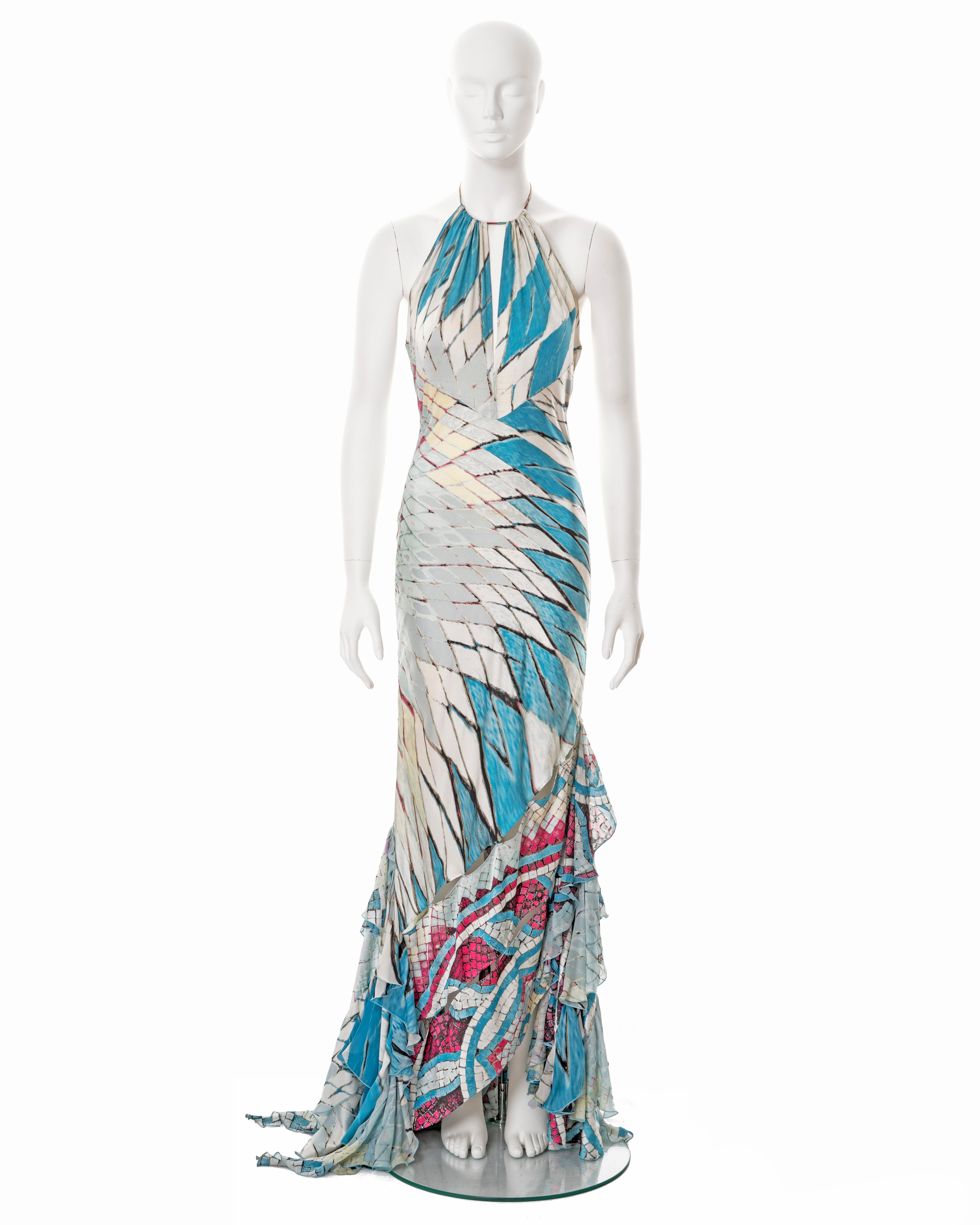 ▪ Roberto Cavalli evening dress
▪ Sold by One of a Kind Archive
▪ Spring-Summer 2004
▪ Constructed from bias-cut silk with blue, ivory and pink mosaic print 
▪ Halter-neck with string ties and pink feather adornments 
▪ Peek-a-boo neckline
▪