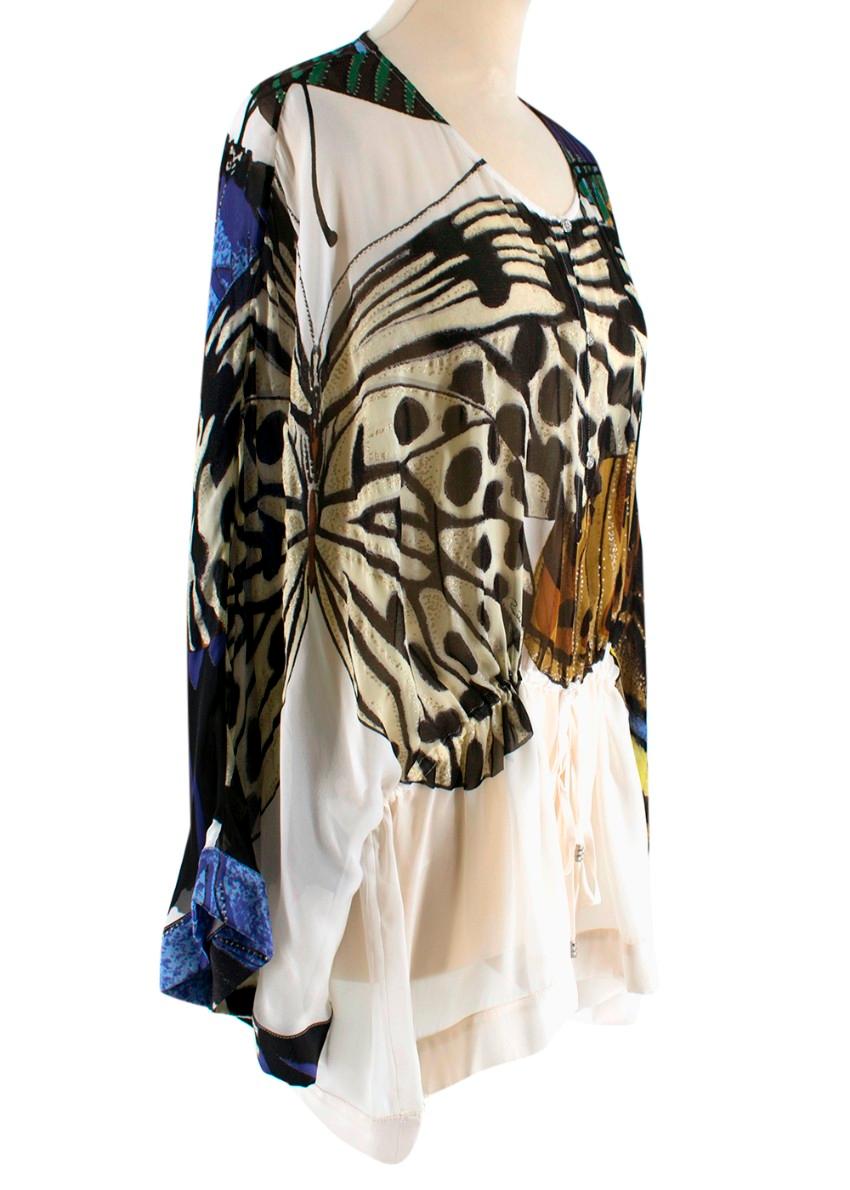 Roberto Cavalli Printed Long-Sleeved Silk Blouse 

- Button Down Front Detail 
- Long-Sleeved
- Waist-tie with gathered Waist 
- Fluted Hemline 
- rounded neckline 
- WideSleeve
- Metallic Detail to Print

Materials 
100% Silk 

Dry Clean Only