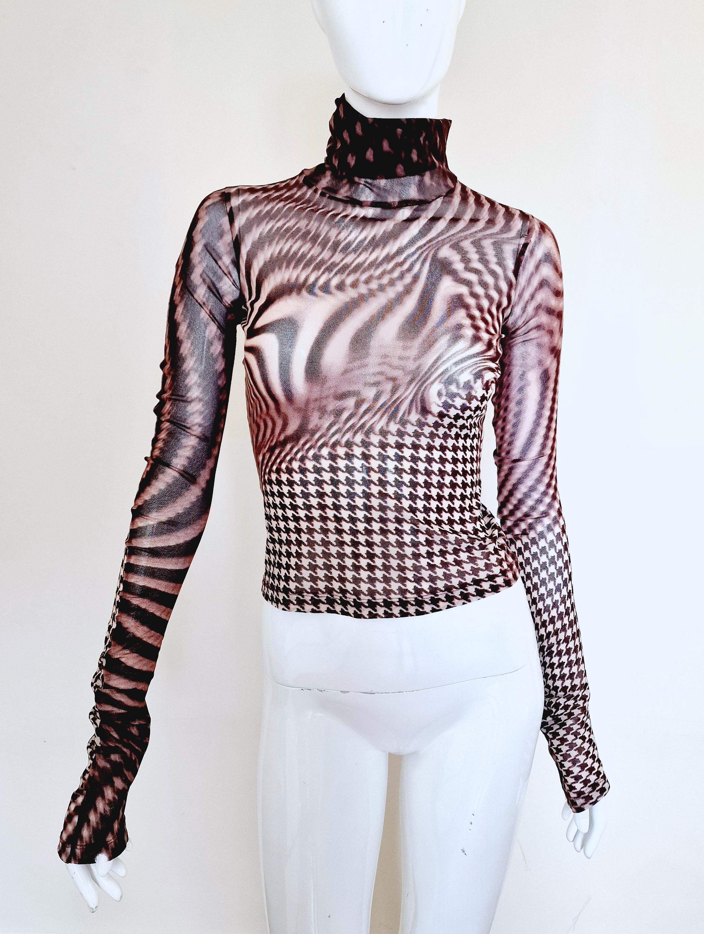 Psychedelic mesh top by Cavalli!
Transparent. 
Extra long sleeves!
Turtleneck.
EXCELLENT condition!

SIZE
It fits from XS to medium.
Marked size: IT44.
Length: 49 cm / 19.3 inch
Bust: 35 cm / 13.8 inh
Waist: 30 cm / 11.8 ich
Shoulder to shoulder: 31