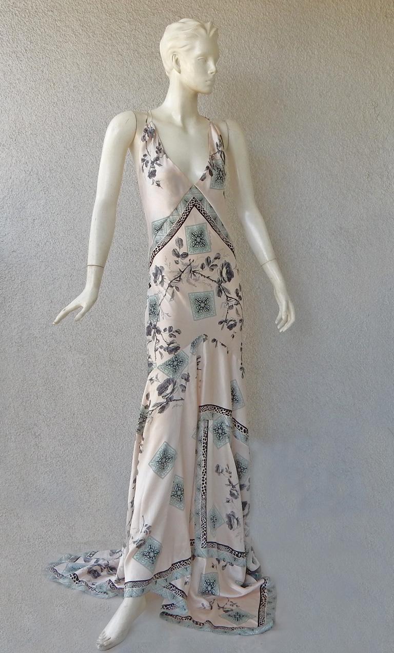 Roberto Cavalli vintage silk charmeuse bias cut gown.  One of the designer's highly coveted styles in his early 2000 collections.  Features eggshell white silk ground with Asian inspired designs in shades of blue.  There is a bit of texture on the