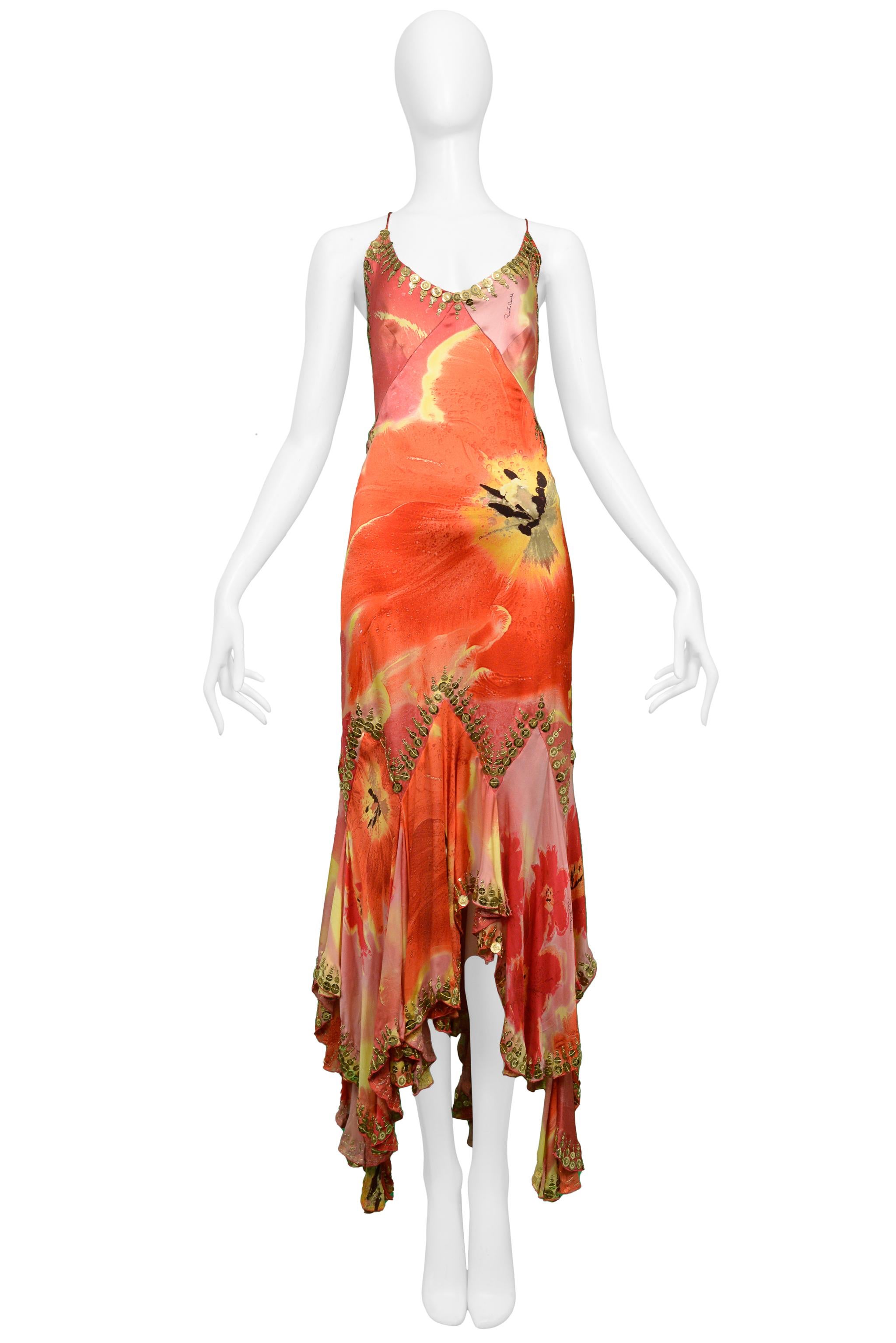 Resurrection Vintage is excited to present a vintage Roberto Cavalli satin slip dress featuring a halter top front, a keyhole back with ties, an abstract floral pink, yellow, red, and orange print, ruffles, gold stitching, sequins, and paillettes.
