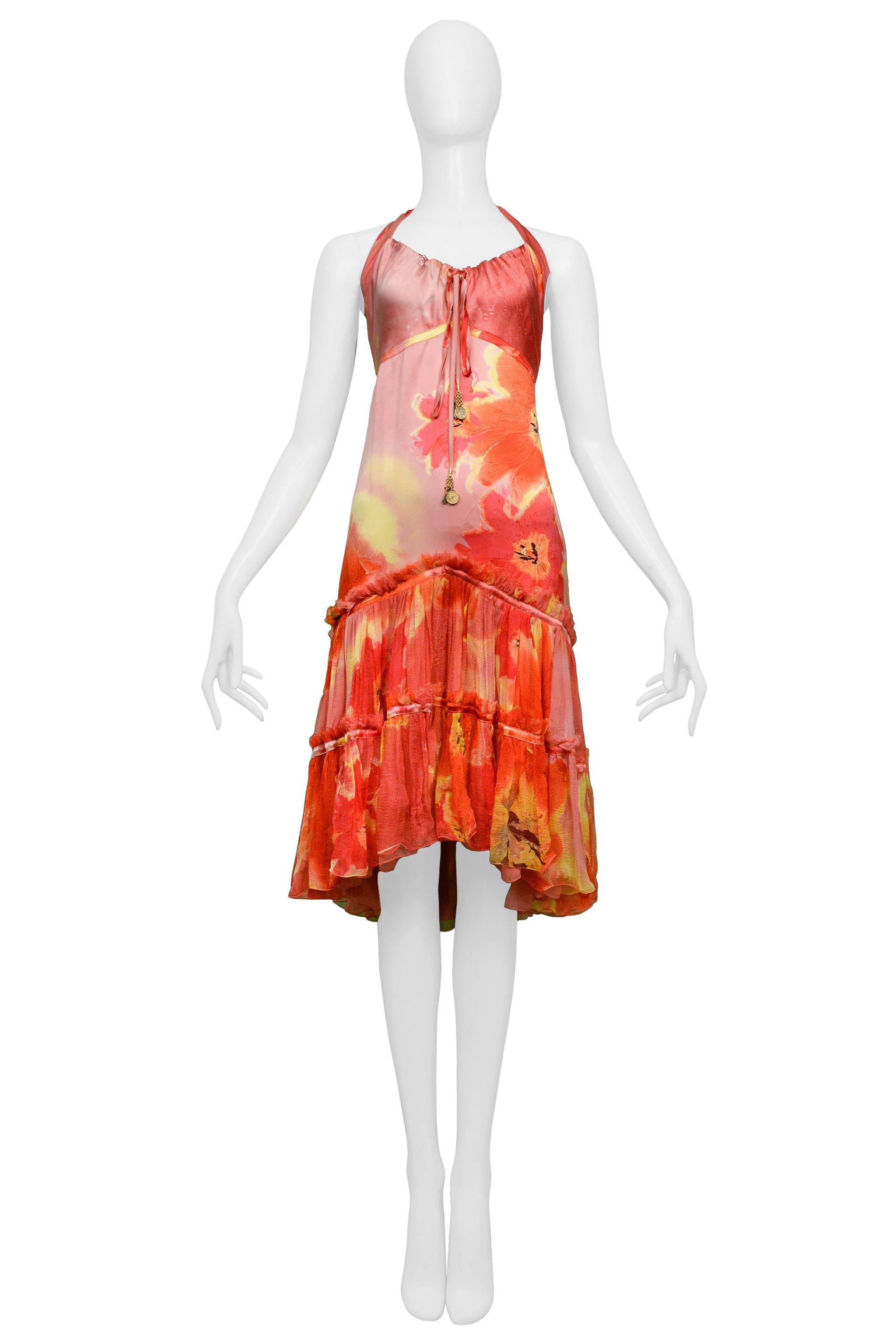 Resurrection Vintage is excited to present a vintage Roberto Cavalli satin slip dress featuring a halter top with ties and gold hardware, an abstract floral pink, yellow, red, and orange print, and ruffles. 

Roberto Cavalli
Size: XS/Small Fits like