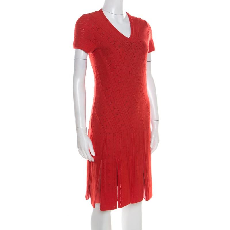This Roberto Cavalli dress is simply beautiful! Crafted from a wool blend, the dress features crochet knitting, fringed hem, short sleeves and a V neckline. Paired up with your favourite sandals, this dress is perfect for afternoon get-togethers.

