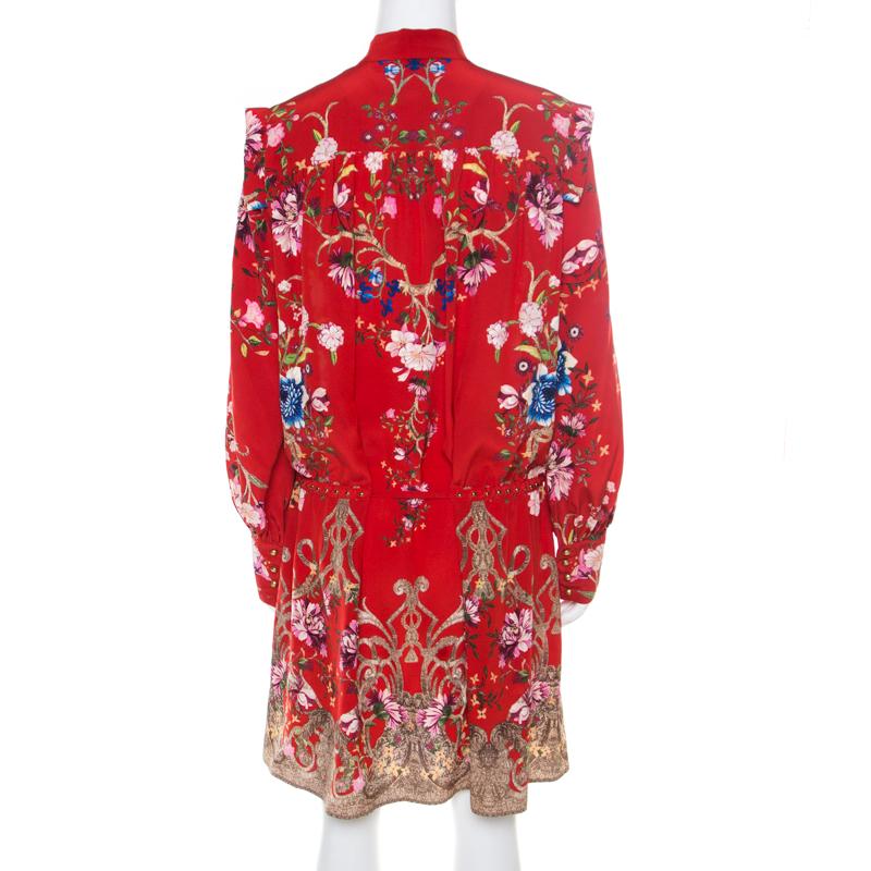Expect statement looks with this chic piece from the house of Roberto Cavalli. Made from superior quality silk, this piece will remain a vintage in your wardrobe. A pretty number like this red floral printed dress requires minimal efforts to look