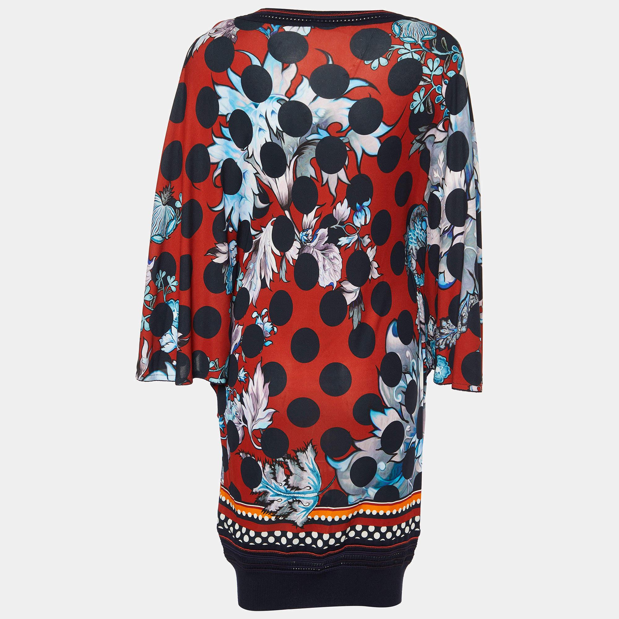 This designer dress is a chic and stylish garment that exudes elegance and sophistication. With its chic design flattering silhouette and high quality craftsmanship this dress is perfect for any special occasion or evening event ensuring you stand