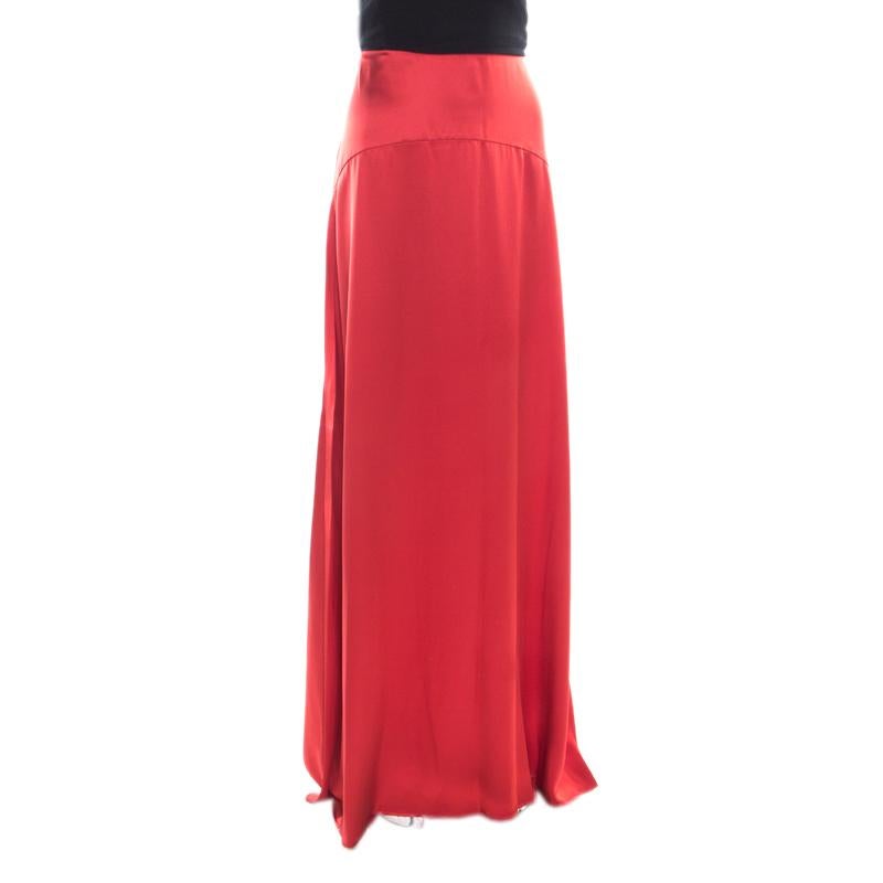 You'll not only love having this skirt in your closet but you'll also love flaunting it whenever you step out of your house. The skirt is a Roberto Cavalli creation and it comes flowing with style. Made from silk, the skirt carries a red shade and a