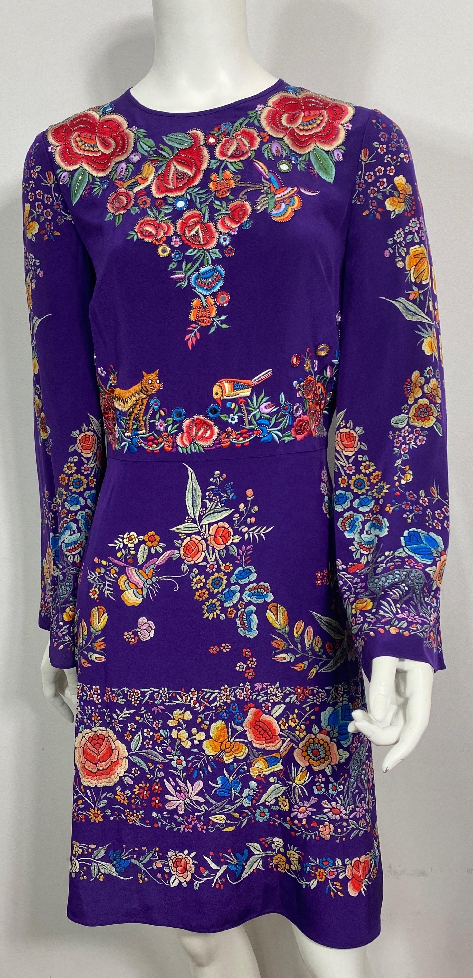 Roberto Cavalli Resort 2017 Purple Multi Embroidered Silk Dress-Size 40 This purple silk print long sleeve dress has a pattern of flowers and bees, birds and cats in multi vibrant colors. The front of the dress has multiple areas with embroidery