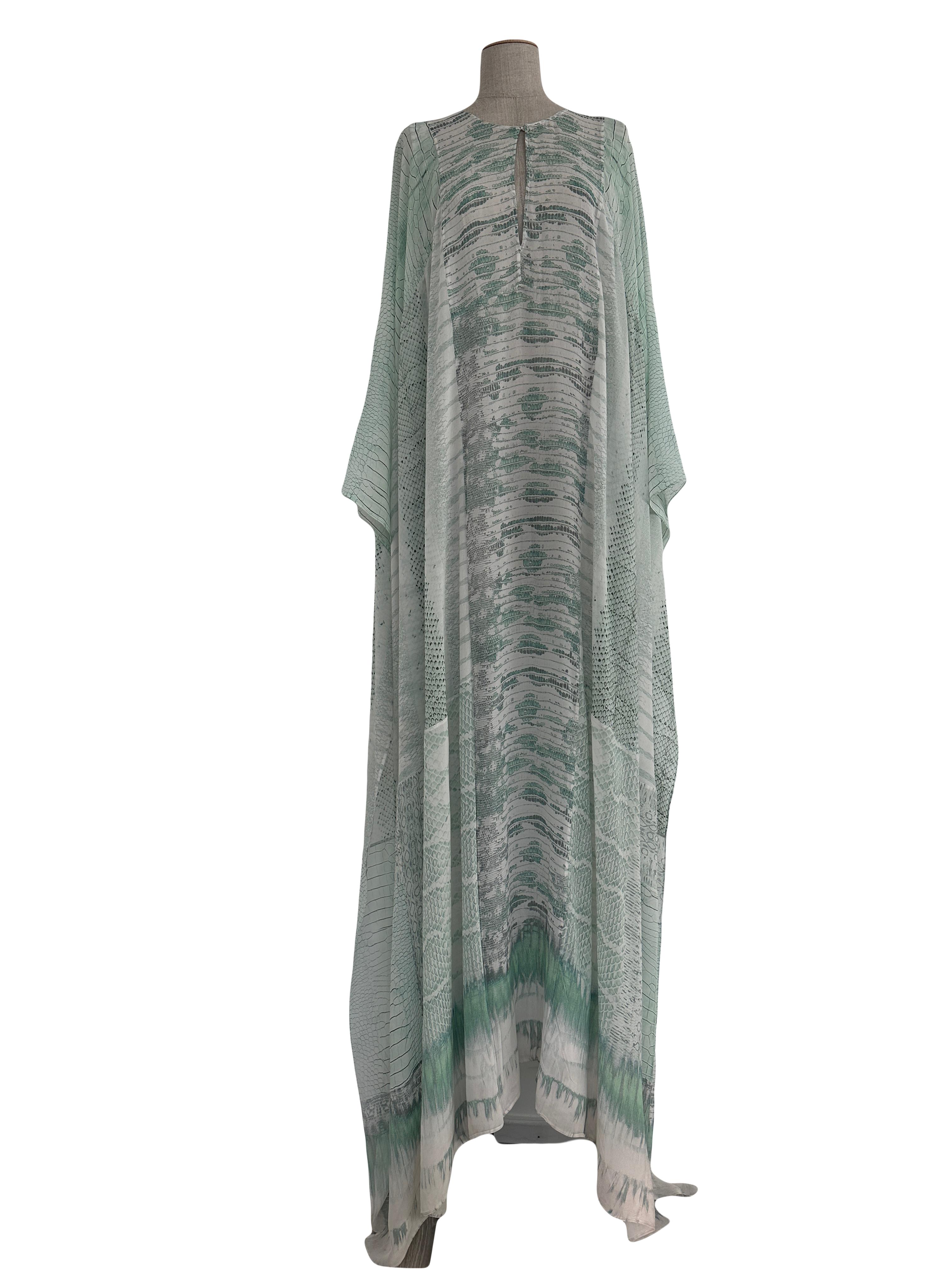 - Roberto Cavalli 
- A star piece of the Spring/Summer 2014 runway collection
- Featured in numerous numerous S/S 2014 editorials  
- Silk Chiffon in a beautiful subtle mint green with snake print
- Haute bohemia
- Maxi length
- Loose fitting so