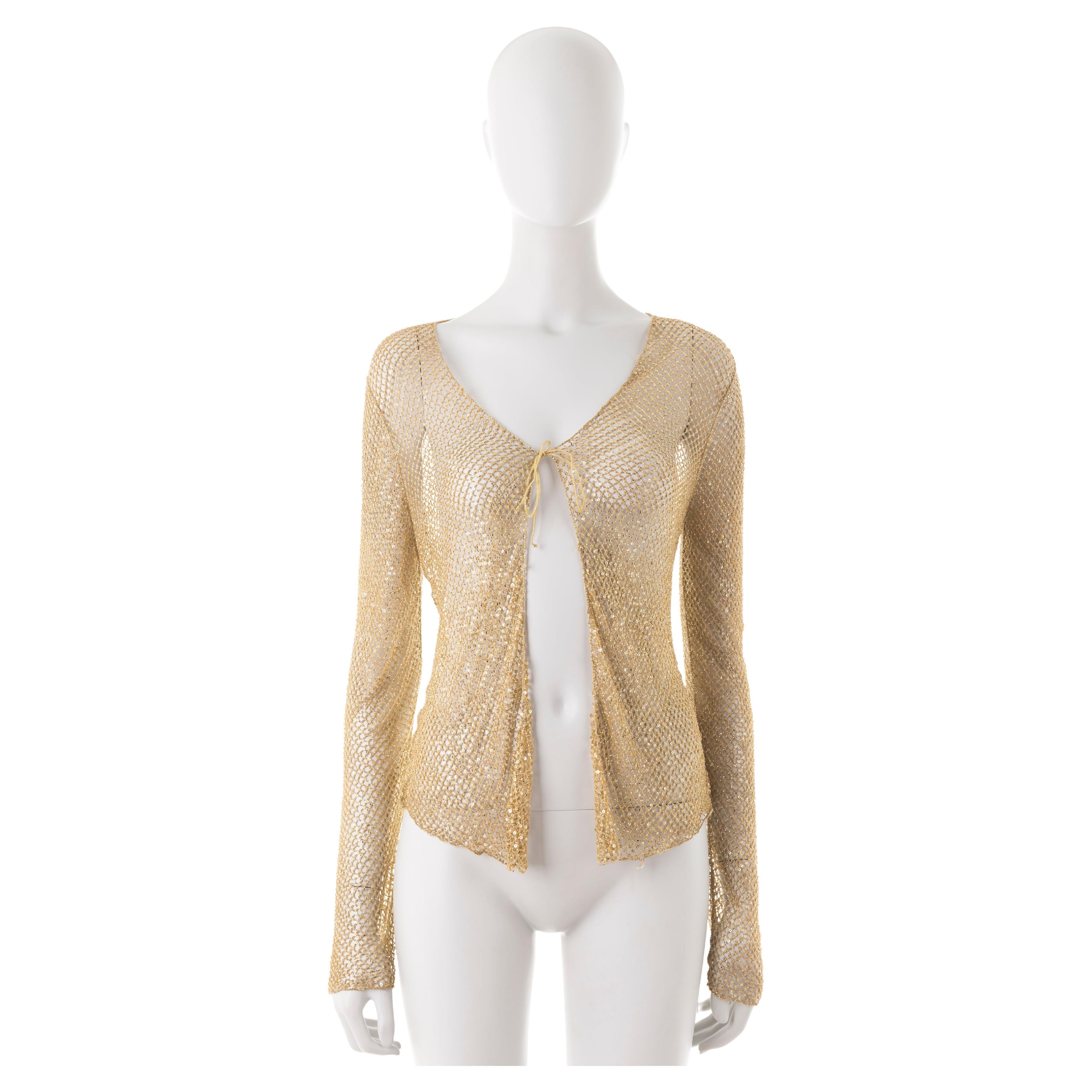 - Fishnet cardigan
- Front tie
- Gold beads
- Size L