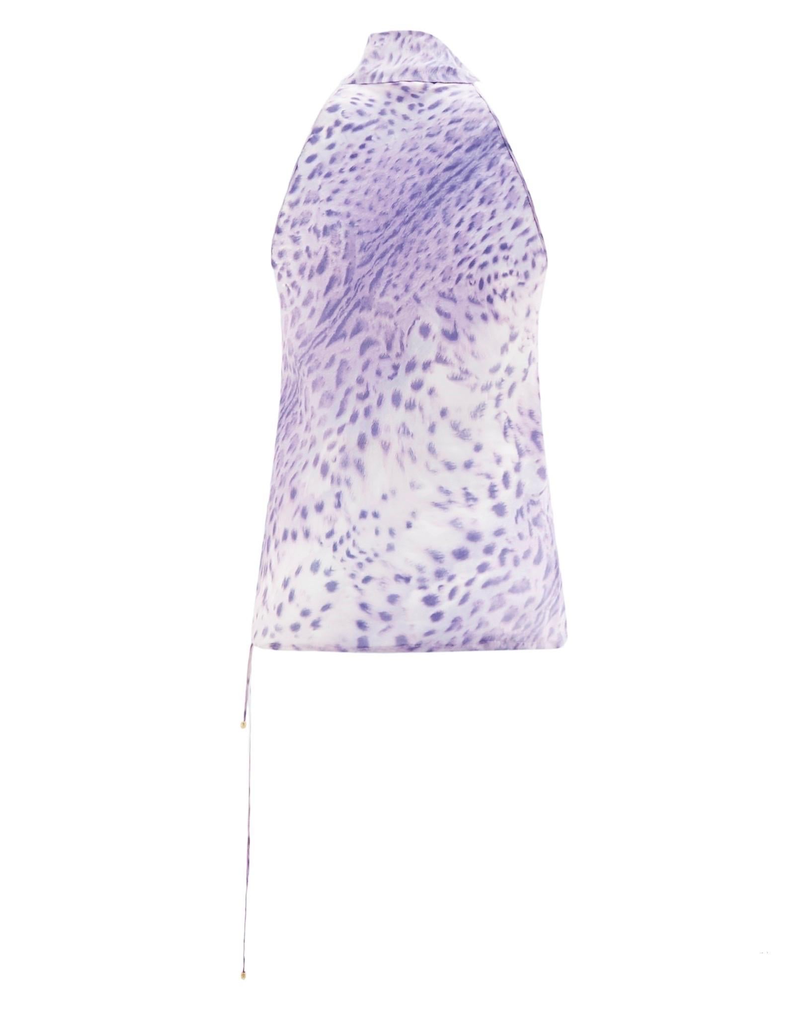 • Turtleneck sleeveless top
• Lilac leopard print
• Side bottom fastening strings
• Runway piece
