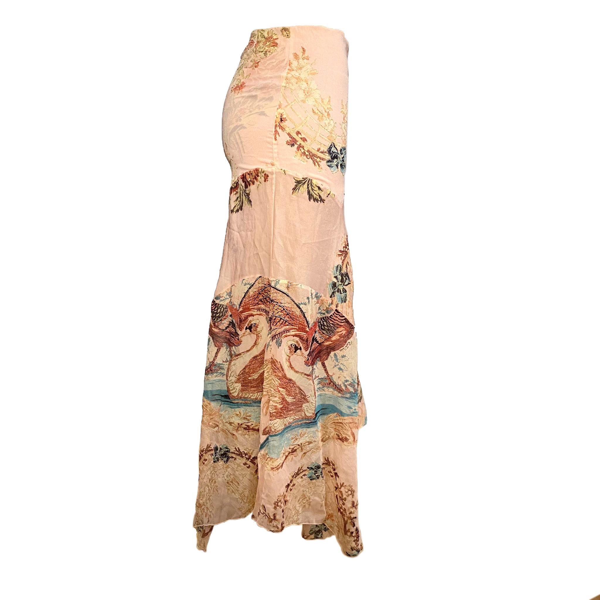 Roberto Cavalli low waist bias cut maxi skirt with allover floral and animal silk jacquard ornaments (including swans and peacocks) from the Spring/Summer 2003 collection.

Size S 

Waistline: 72 cm / 28,3 inch

Hip: 84 cm / 33 inch

Length: 83 cm /