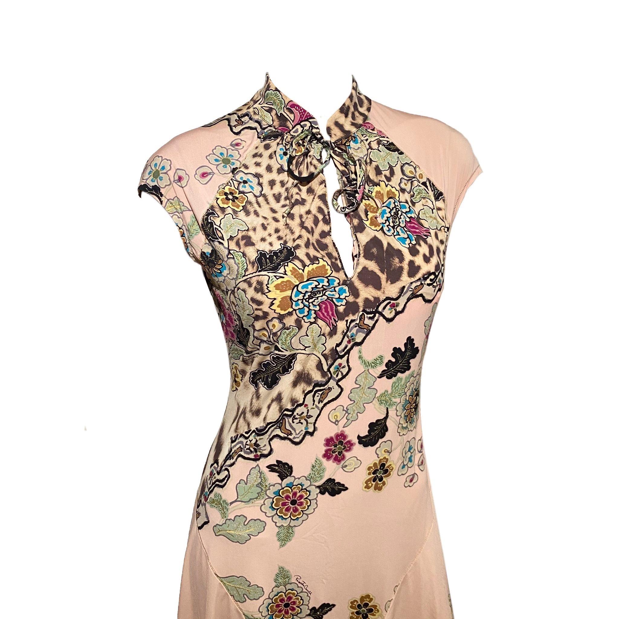 Roberto Cavalli Cheongsam-inspired pink maxi dress with chest cut-out detail from the Spring/Summer 2003 collection. Oriental floral print (with gold glitter lining) and cheetah print, bias cut.

Size M, 90% Polyamide 10% Elastane 

Shoulder to