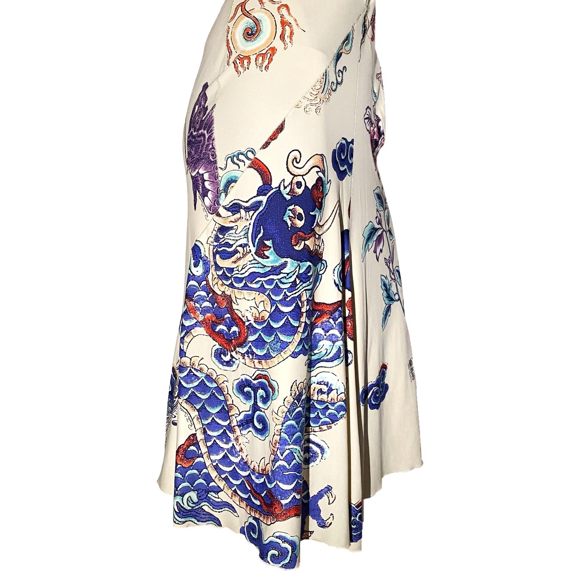 Roberto Cavalli off-white midi dress with internal boned corset, front lace up detail (with extended  laces which can be styled at will) and back hook closure. Japanese inspired old school tattoo print featuring flowers, clouds and Ryu dragons with