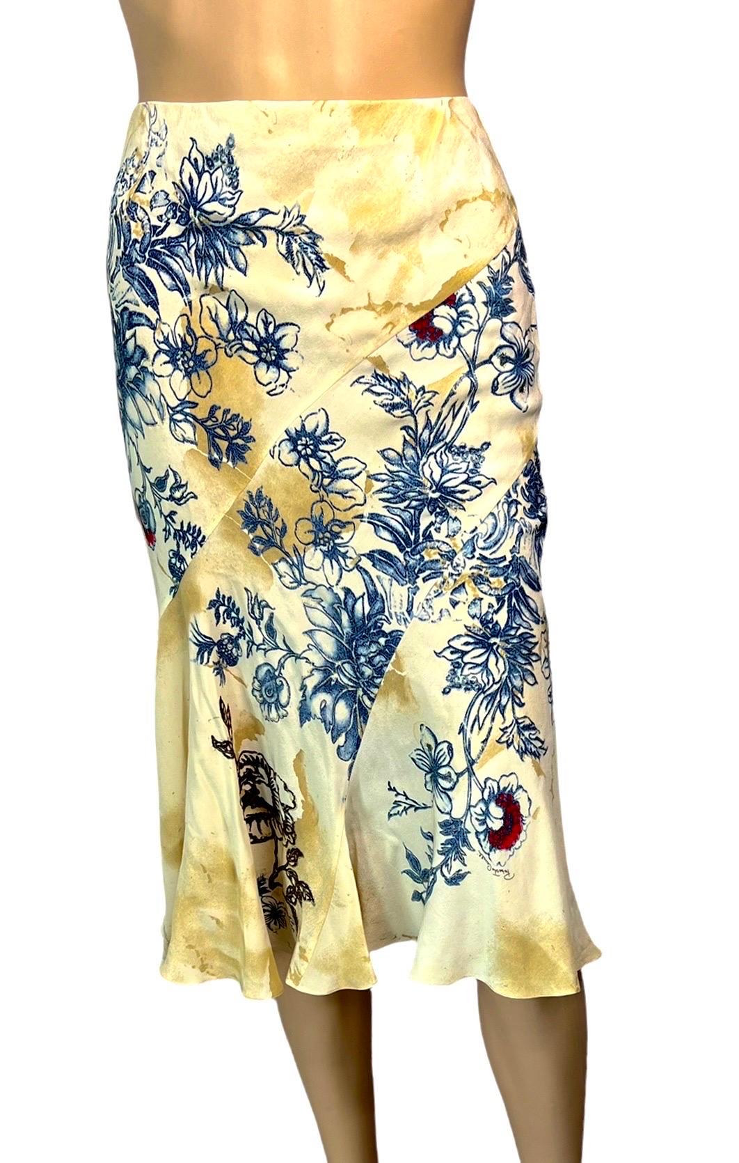 Roberto Cavalli S/S 2003 Runway Tattoo Print Silk Midi Skirt

Please note size tag has been removed. Also, there is a slight adjustment at the waist over the designer tag (please see last photo).
