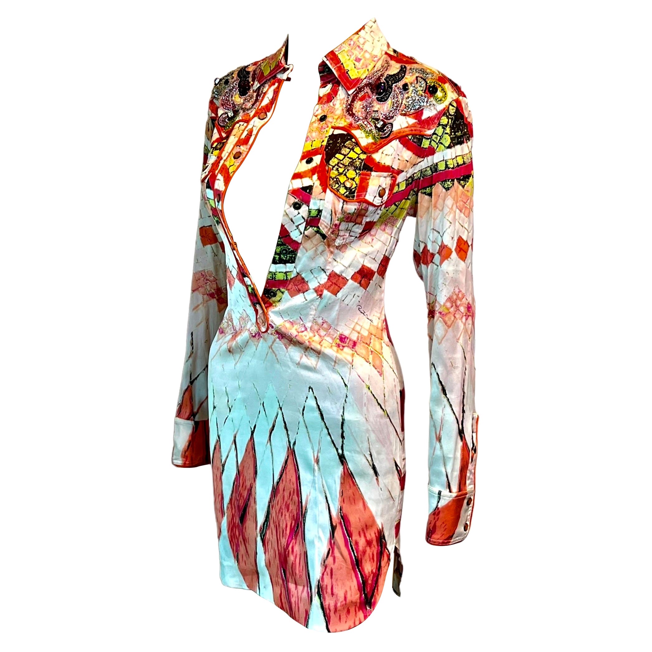 Roberto Cavalli - Passerella P/E 2004 - Vestito a camicia con bottoni a pressione, impreziosito da una serie di dettagli