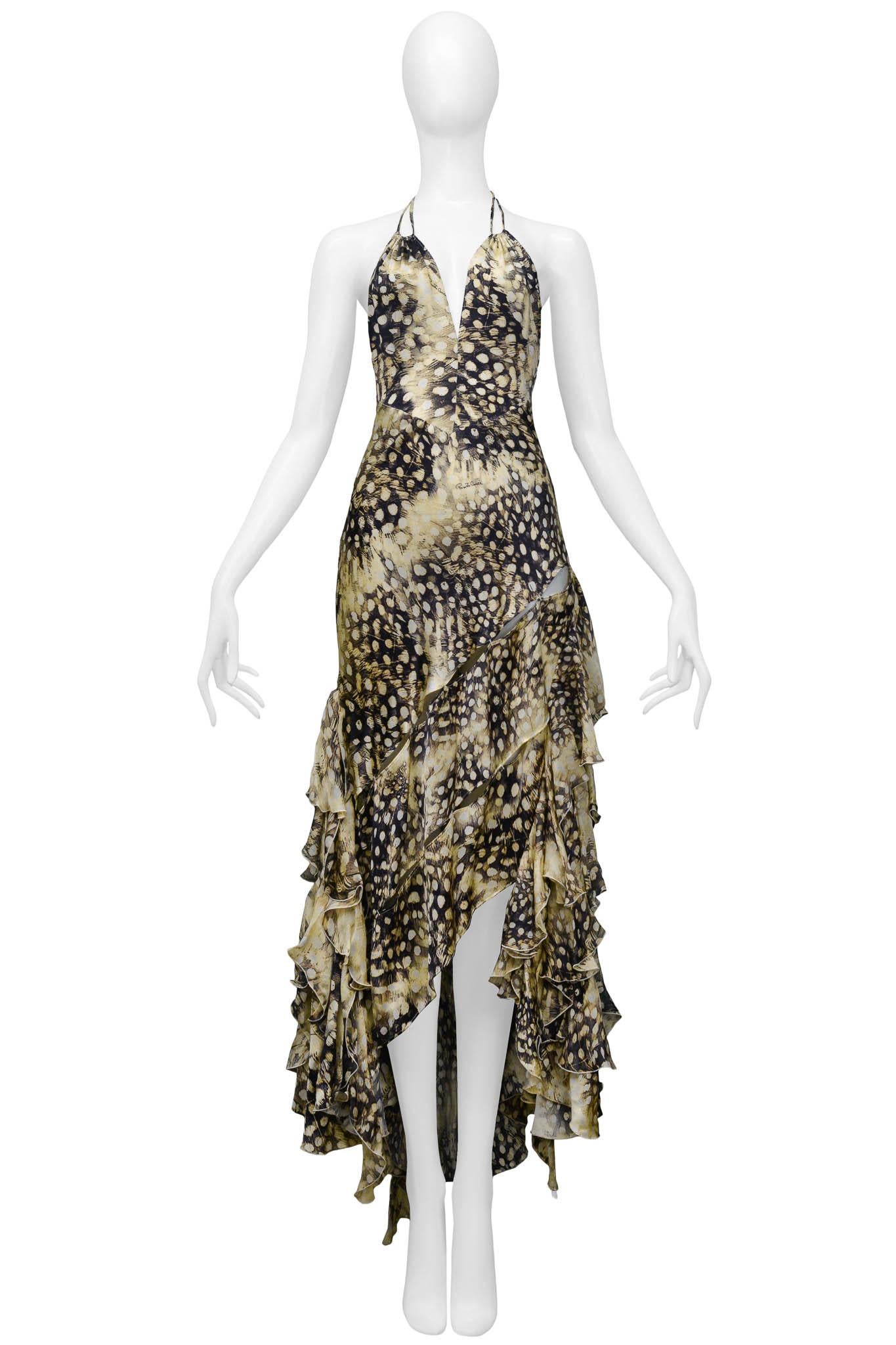 Resurrection Vintage is excited to present a vintage Roberto Cavalli neutral tone feather print silk evening gown featuring bead and feather detailing at neckties, a deep V neckline, slashes throughout the skirt of the dress, and an open back.