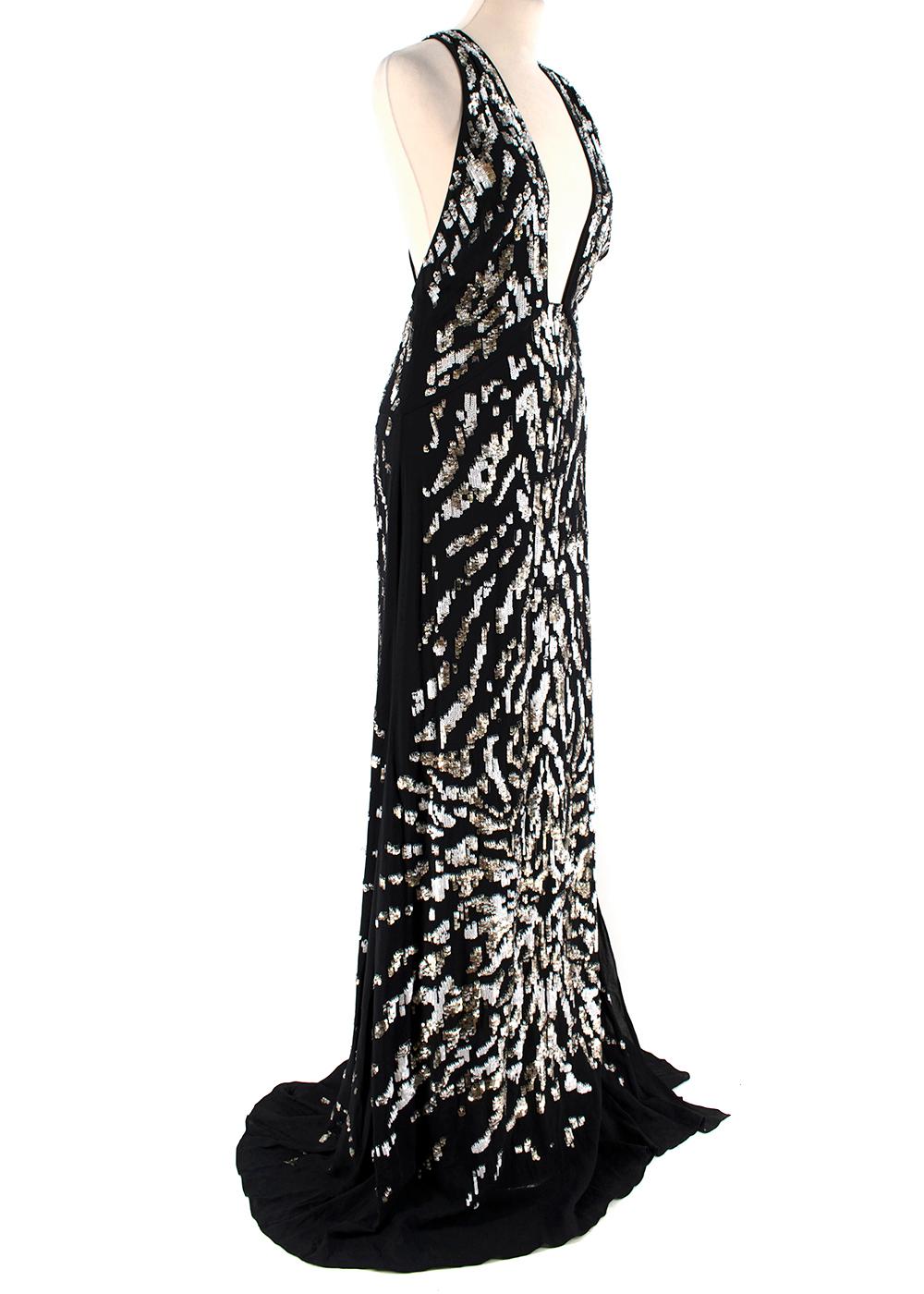 Roberto Cavalli Sequin Embellished Plunge Low Back Gown

- Spaghetti strap backless design
- Complete white and gold sequin embellishments 
- Maxi length 
- Metal strap embellishment
- Cross-over back
- Concealed back zip and eyelet fastening