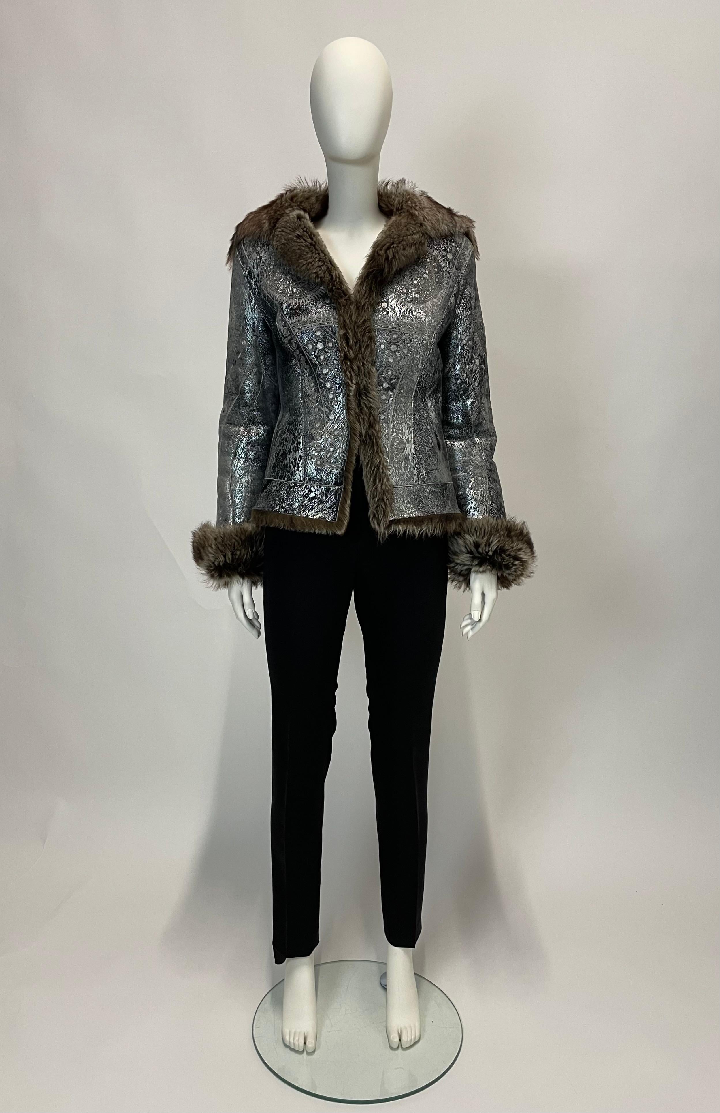 Warm and comfortable, a beautiful shearling jacket is a forever piece but that doesn't mean it can't have personality. This one by Cavalli's has a bohemian feel. It's made from shearling and contrasting leather reverse. Unlined. Labeled a size Small