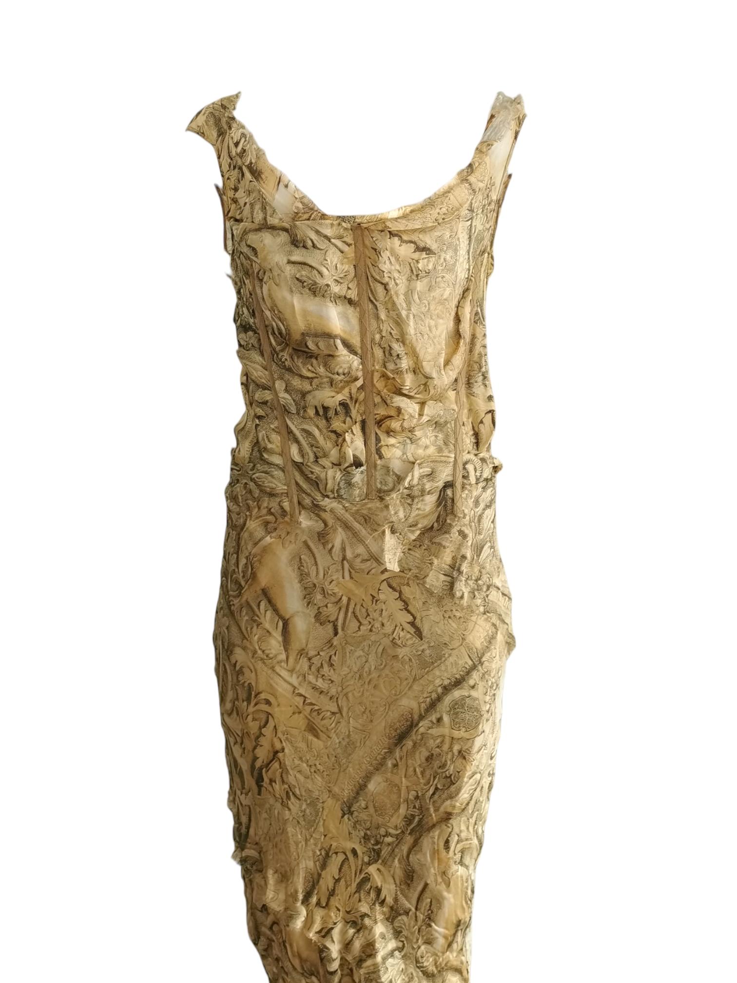 My Runway Archive presents a gold corseted runway gown from the Roberto Cavalli FW 2001 collection. 
Material: Silk
Size: Size label is missing but fits like a UK 12. Measurements taken upon request.
Condition: Good the material is supposed to have