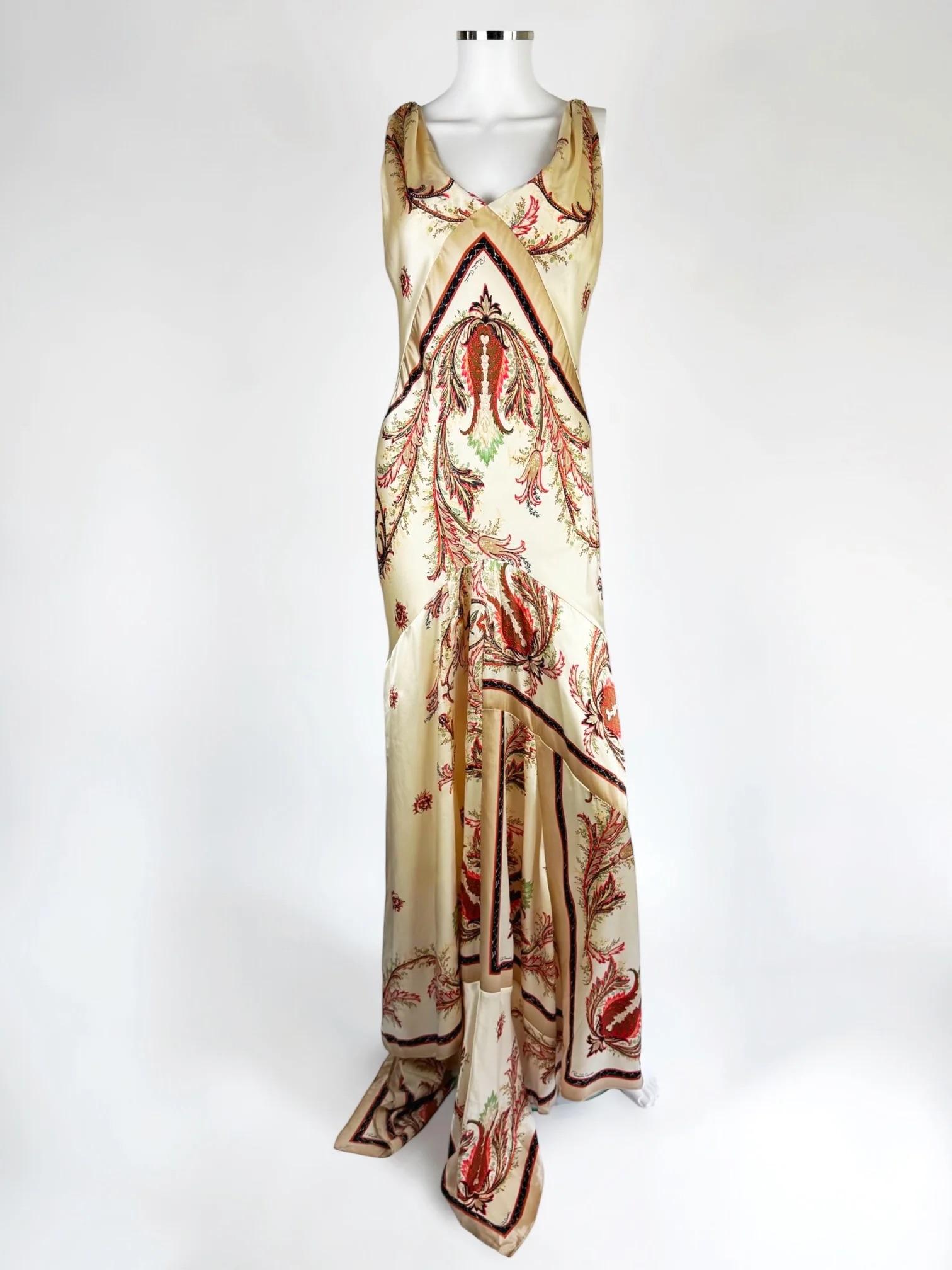Roberto Cavalli silk evening gown, Fall 2004
A stunning example of Cavalli's signature aesthetic, merging luxury with bohemian opulence. The gown is made from silk satin and has a fluid, body-skimming silhouette that flares slightly at the hem into