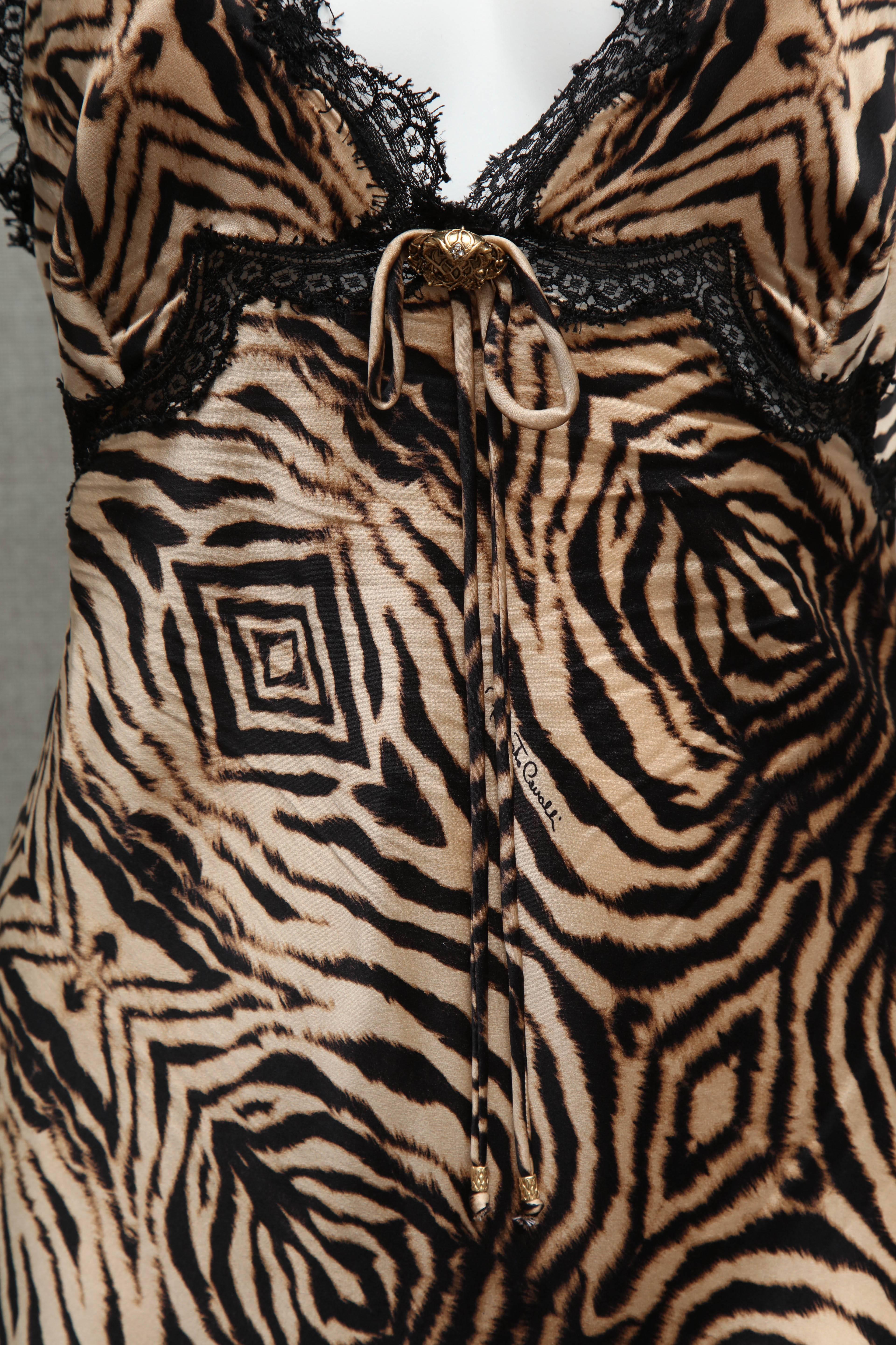 Roberto Cavalli Leopard Print silk slip dress with lace details. 

Size: 42