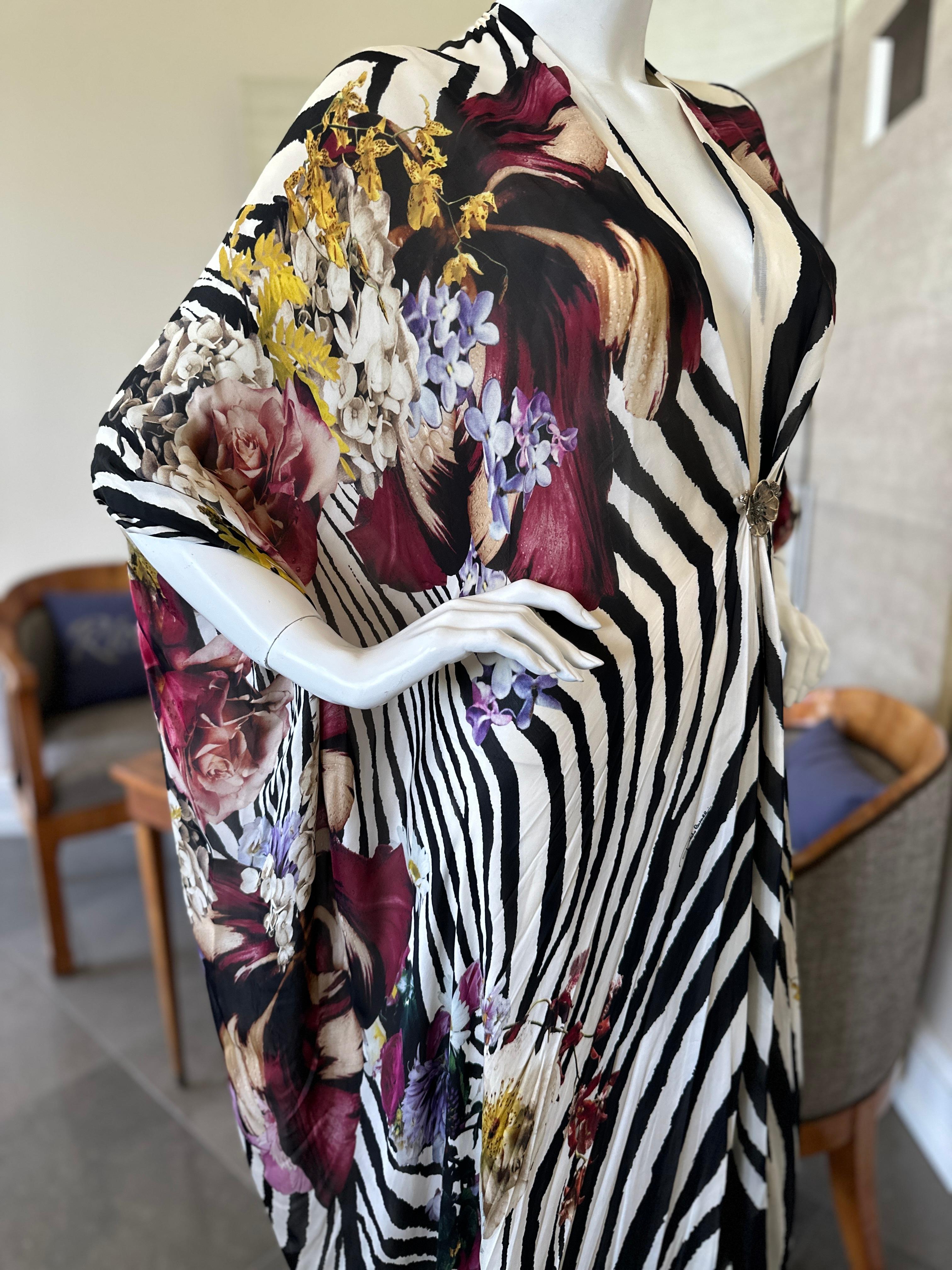 Roberto Cavalli Sensational Vintage Silk Zebra and Floral Print Caftan.
 Simply sensational.
Just toss it over your swimsuit to go from beach to bar.
 Size 38 but it is really an XXL
  Bust 48