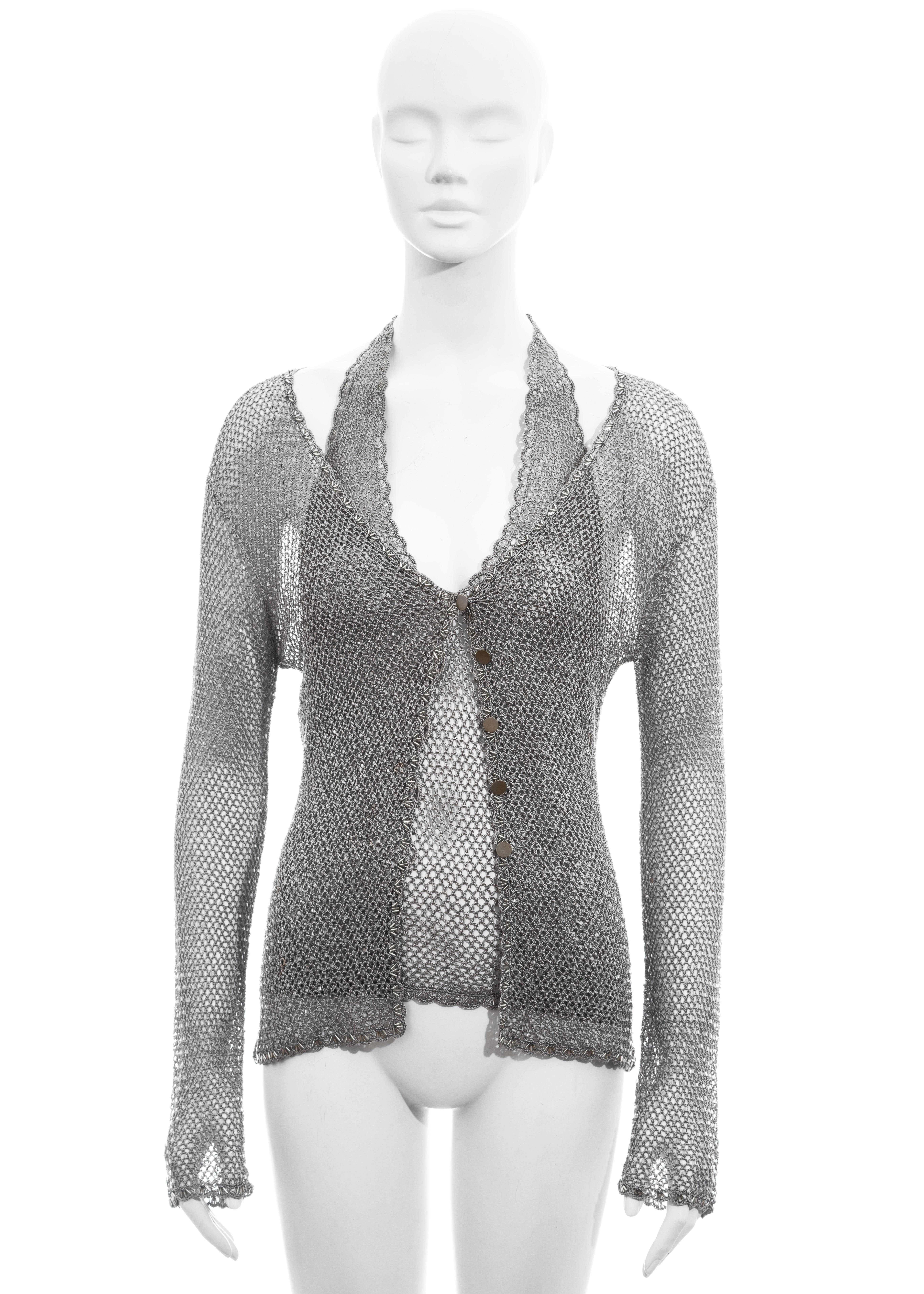 ▪.Roberto Cavalli silver crochet knit two piece set
▪ 100% Viscose 
▪ Clear beading throughout 
▪ Long sleeve button-up cardigan
▪ Halter-neck vest
▪ Size Small
▪ Spring-Summer 2001
