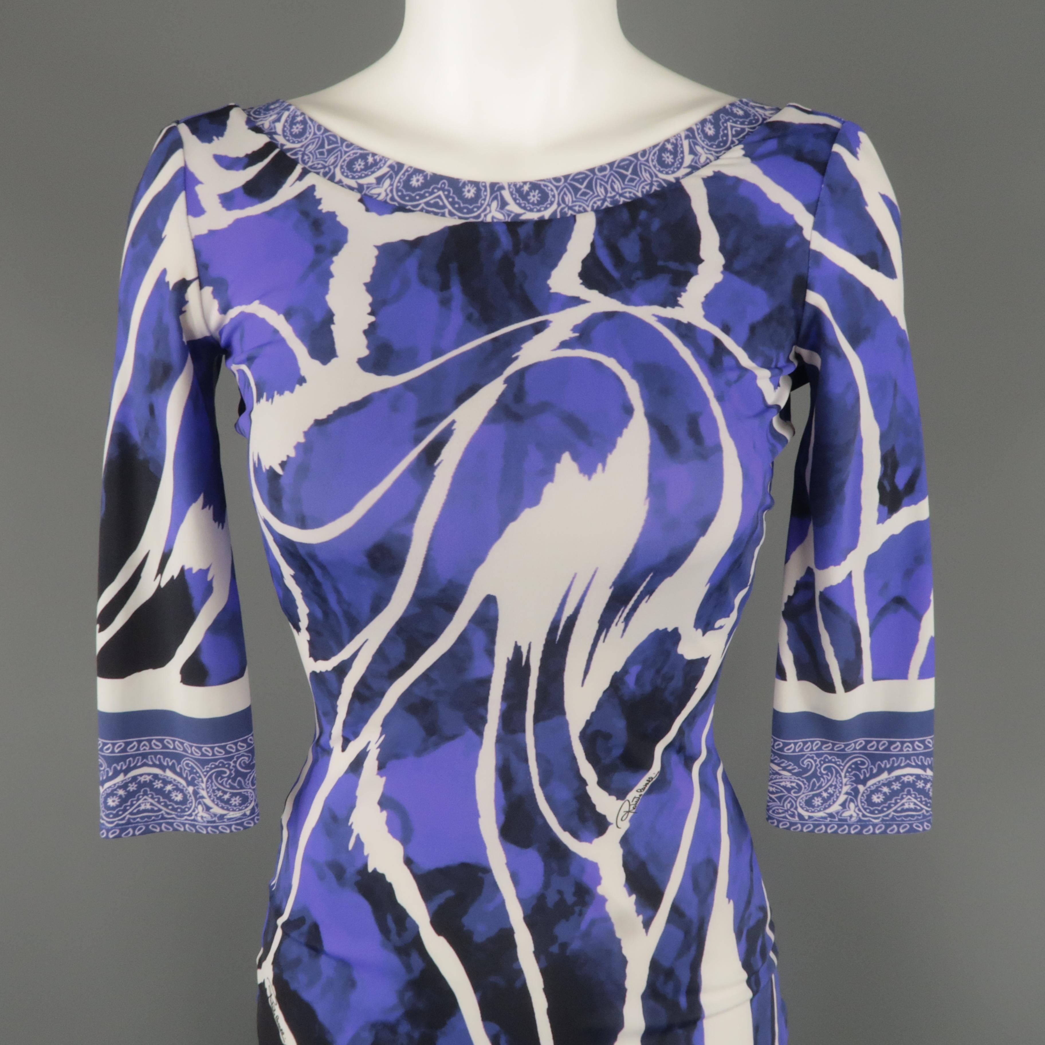 ROBERTO CAVALLI bodycon mini dress comes in purple marble print stretch fabric with a wide neckline, three quarter sleeve, bandana print trim, and deep V back. Made in Italy.
 
Excellent Pre-Owned Condition.
Marked: IT 38
 
Measurements:
 
Shoulder: