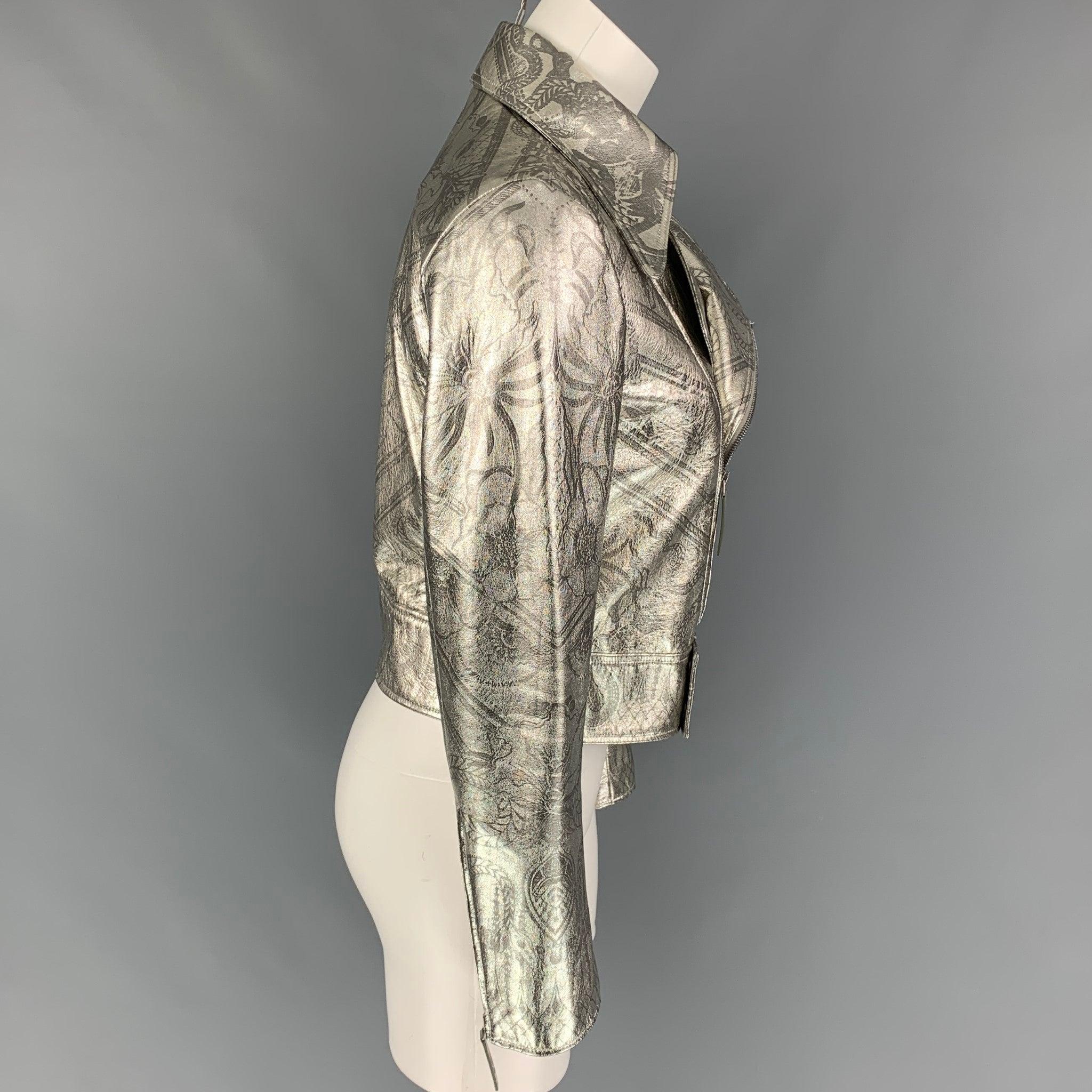 ROBERTO CAVALLI jacket comes in a silver metallic print leather with a full liner featuring a bike style, cropped fit, zipper pockets, and a zip up closure. Made in Italy.
Very Good
Pre-Owned Condition. 

Marked:   40 

Measurements: 
 
Shoulder: 15