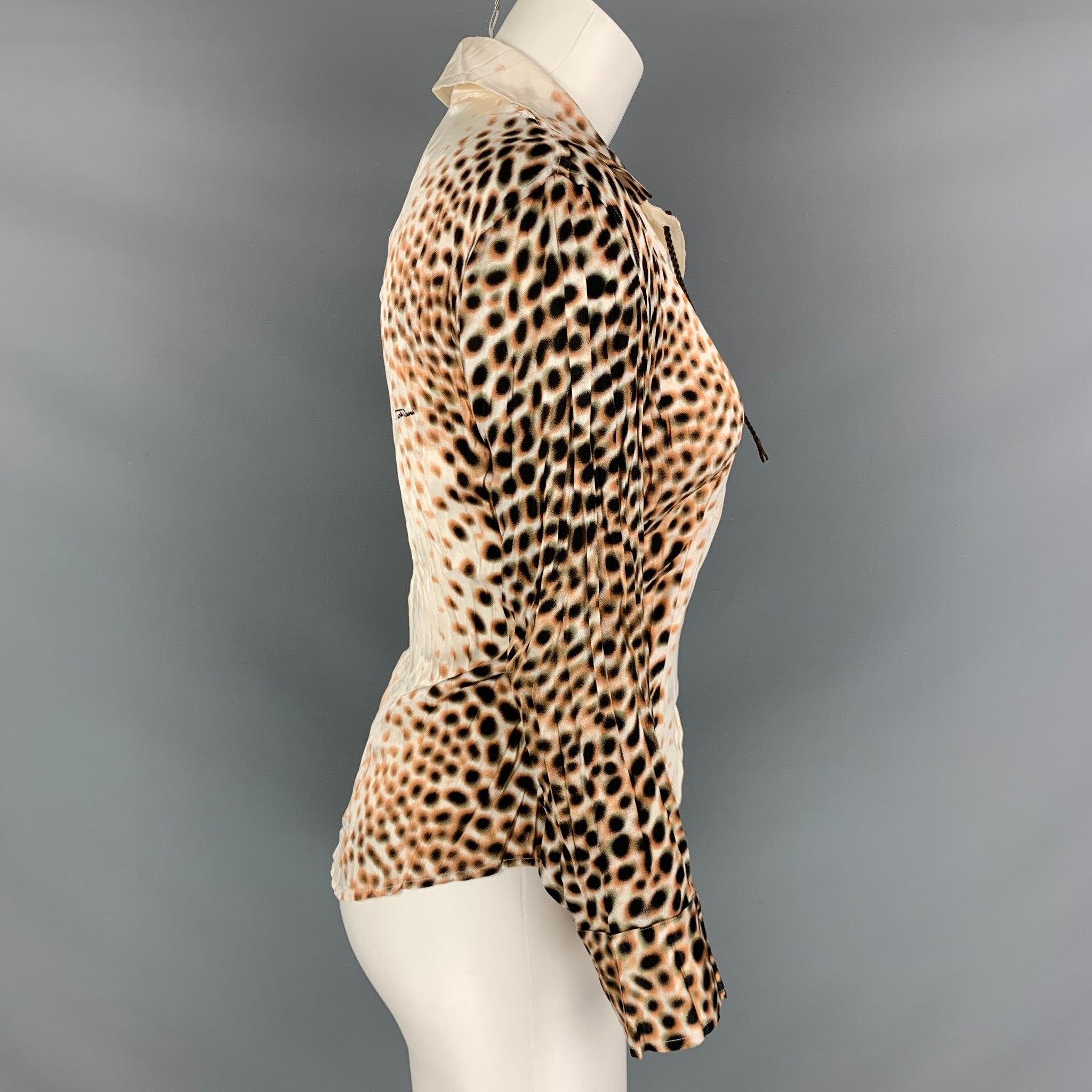ROBERTO CAVALLI long sleeves shirt comes in brown and white silk woven material features an animal print style, and leather tie closure at center front. Made in Italy.Excellent Pre-Owned Condition.Marke: S 

Measurements: 
 
Shoulder: 16 inches
