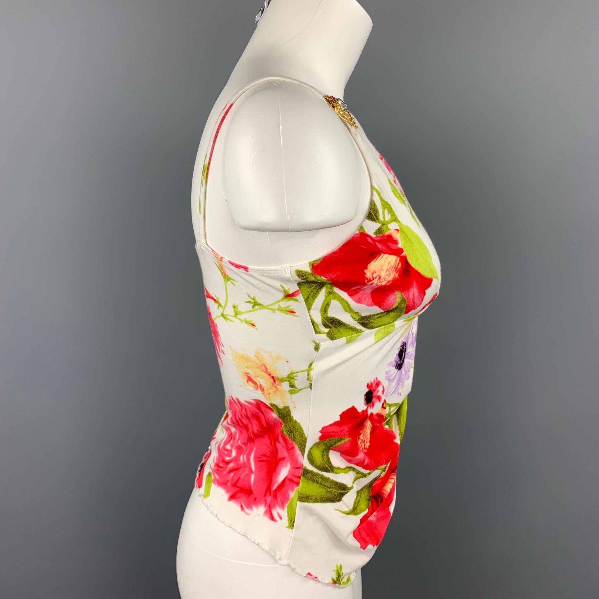 ROBERTO CAVALLI blouse comes in a multi-color floral jersey material featuring spaghetti straps, rhinestone embellishments, and a ruched hem. 

Very Good Pre-Owned Condition.
Marked: No fabric tag

Measurements:

Bust: 28 in.
Length: 11 in. 
