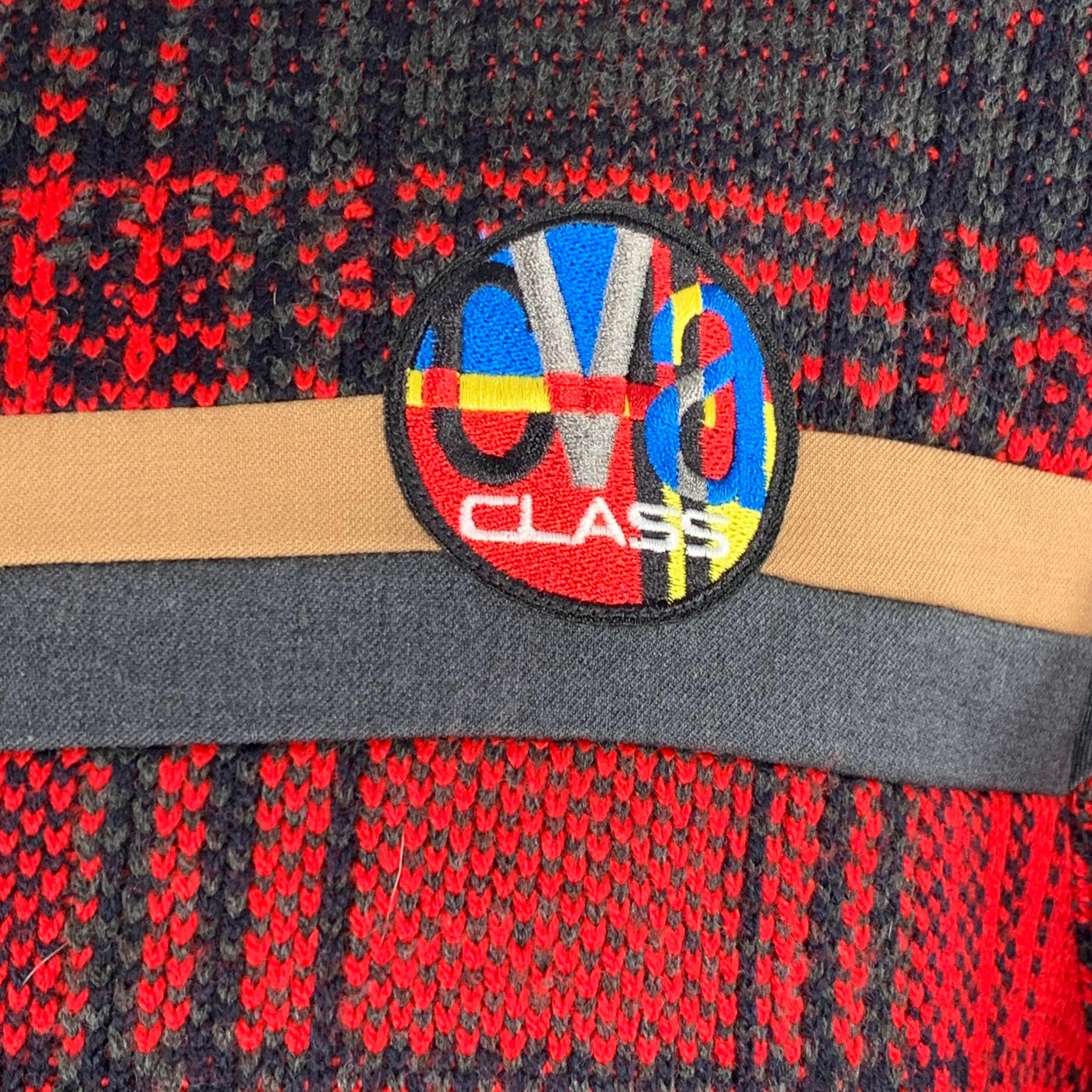 CLASS by ROBERTO CAVALLI sweatshirt pullover
in a black and red polyester blend featuring a plaid pattern, tan and grey stripe detail, logo patch, and crew neck. Made in Italy.Very Good Pre-Owned Condition. Minor snag. 

Marked:   XL 

Measurements: