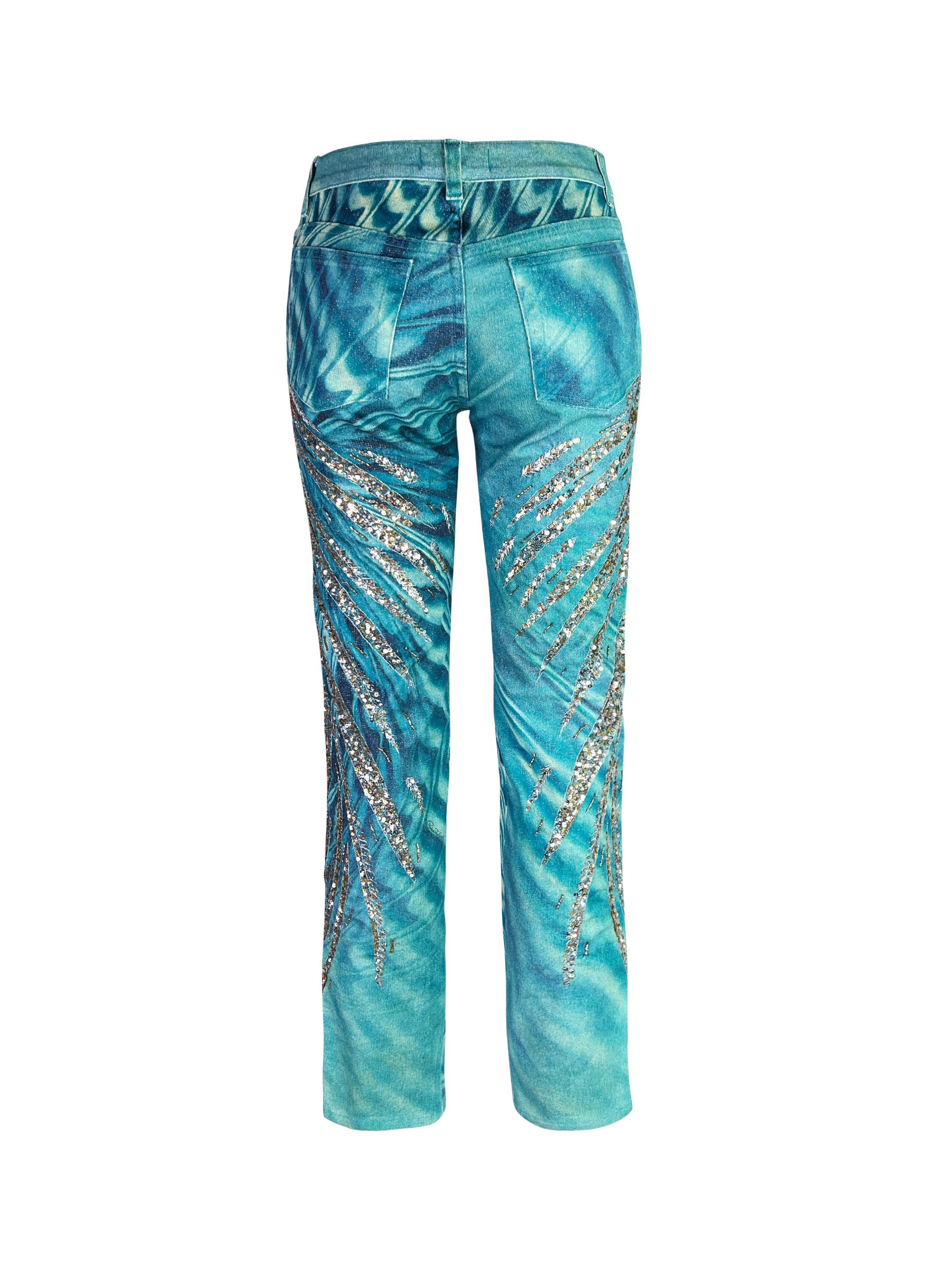 tunning Roberto Cavalli jeans as seen on the runway of Spring 2001 collection. Beautiful sequins embroidery on the iconic optical illusion print with golden metallic shine.

Size S. Slightly stretchy (2% elastane). Measurements (flat lay on one