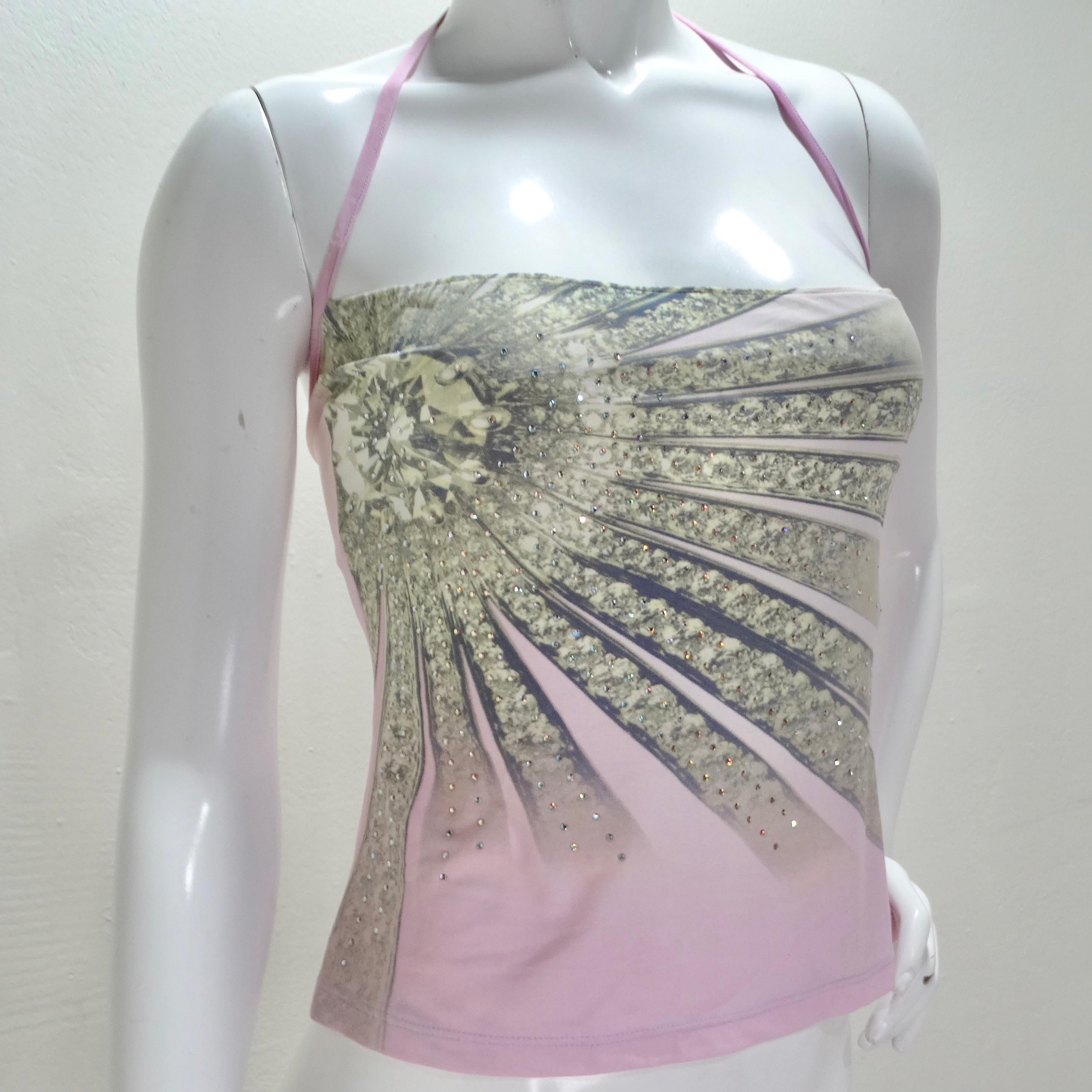 Introducing a piece of fashion history—the Roberto Cavalli Spring/Summer 2000 Pink Crystal Halter Top. This iconic pink halter-style tube top not only showcases the legendary Italian designer's artistic prowess but also epitomizes the glamour and