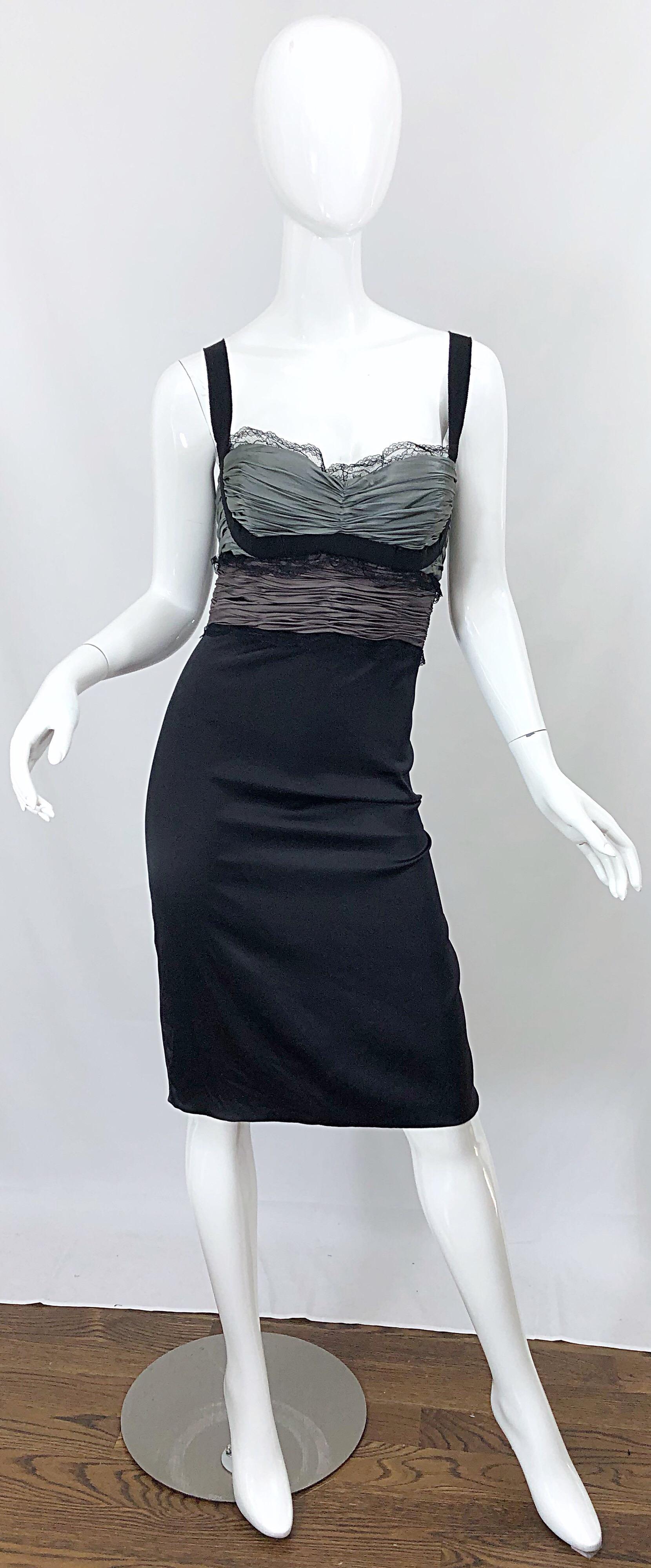 Sexy ROBERTO CAVALLI black and gray silk dress! Bodice features two different shades of grey. Black lace above the bust. Flattering black silk grosgrain ribbon tracing the bodice. Hidden zipper up the side with hook-and-eye closure.  Great with