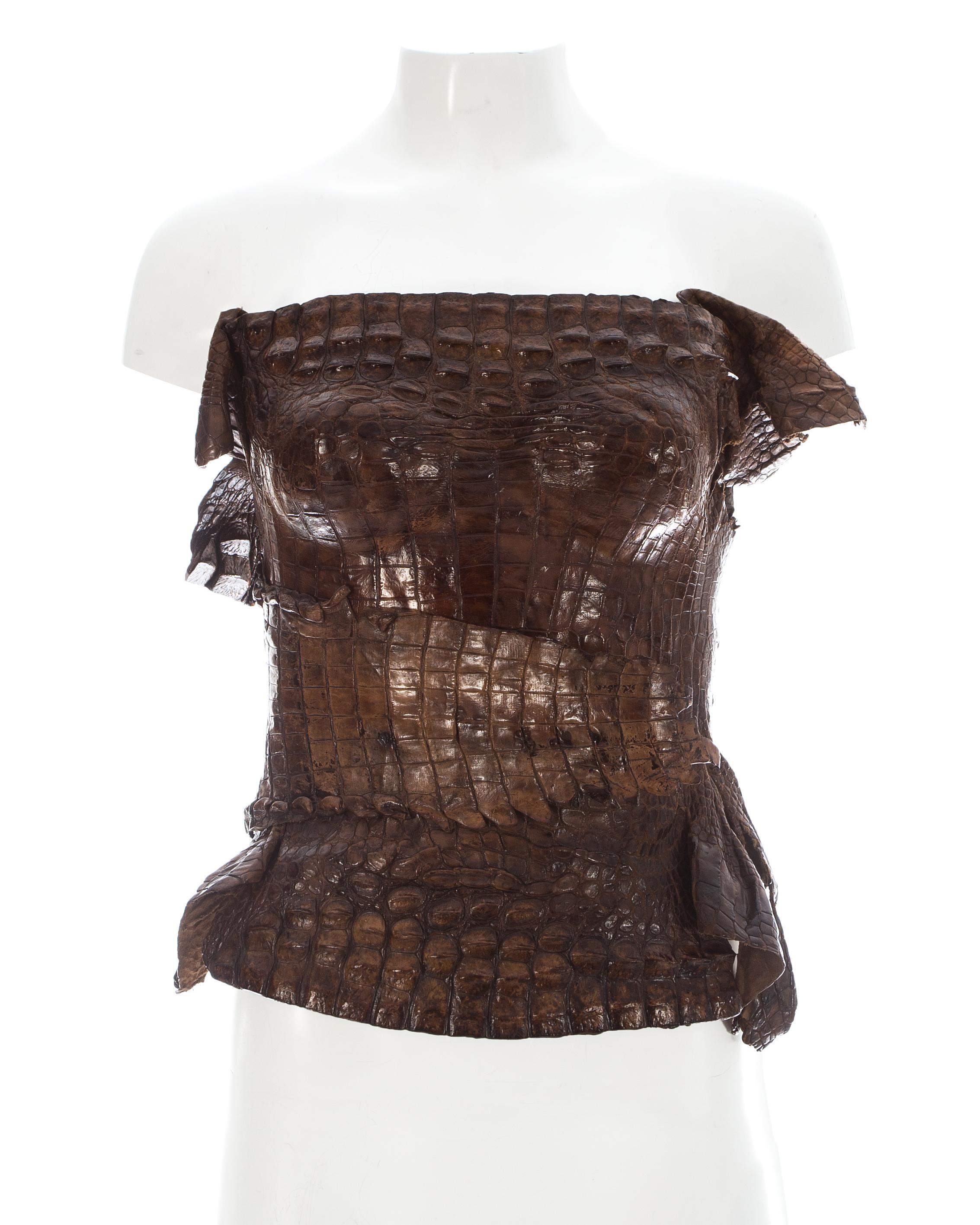 - Full crocodile skin with raw edge 
- Wrap design with adjustable metal clasp closure 
- Moulded bust 

c. 2000s