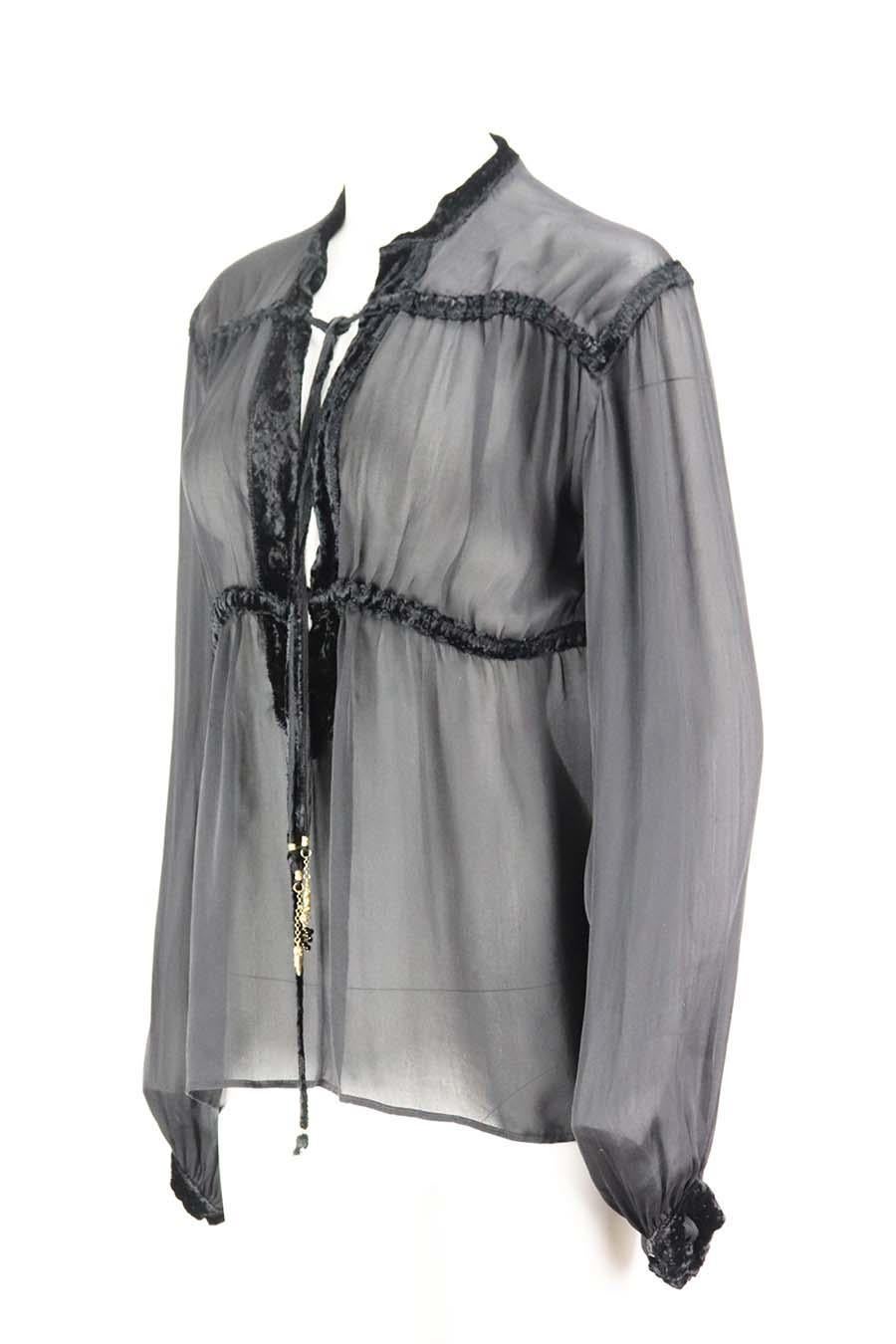 This blouse by Roberto Cavalli is made from silk-georgette and trimmed with rich velvet detail and has a slightly loose fit. Black silk. Slips on. 100% Silk. Size: IT 40 (UK 8, US 4, FR 36). Bust measures approx. 40 inches. Waist measures approx.