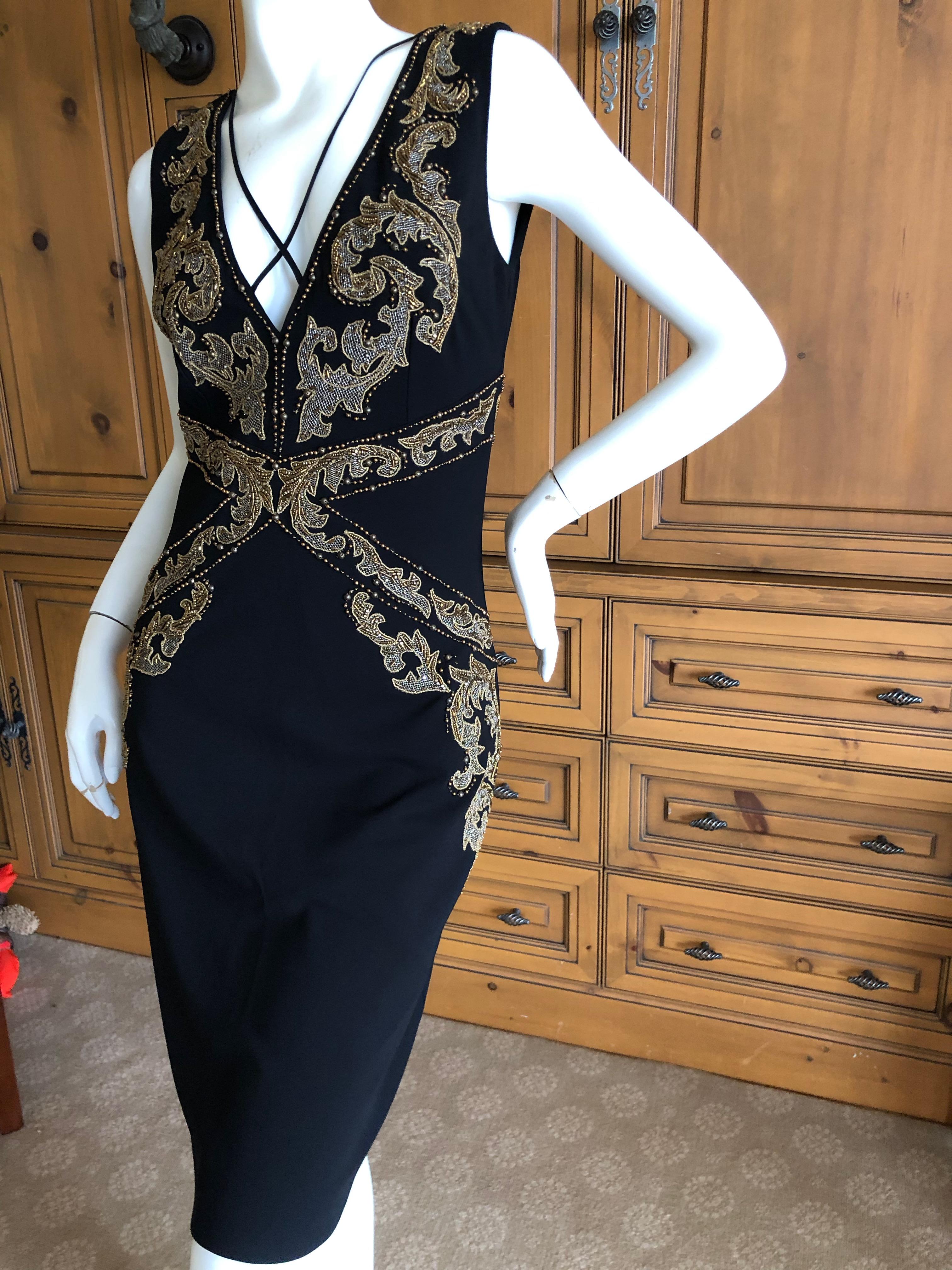 Roberto Cavalli Vintage 90's Black Baroque Pattern Embellished Cocktail Dress
Size 42
This is so pretty, please use the zoom feature to see details.
Bust 36