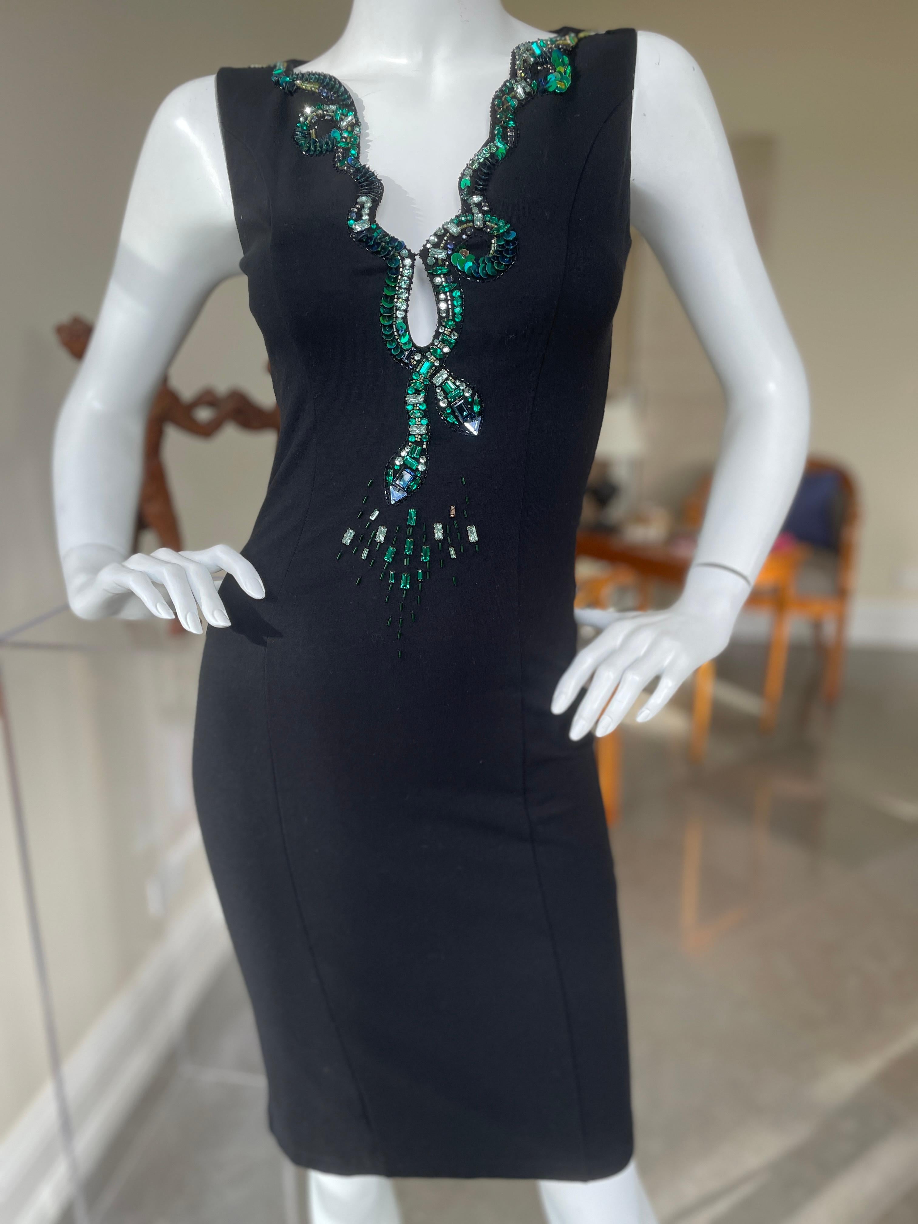 Roberto Cavalli Vintage Black Bodycon Dress with Embellished Snake Collar.
Who created the first snake embellished fashion? Ask Eve.
This is amazing, very stretchy dress, hugs all the right places.
Size 40
 Bust 34