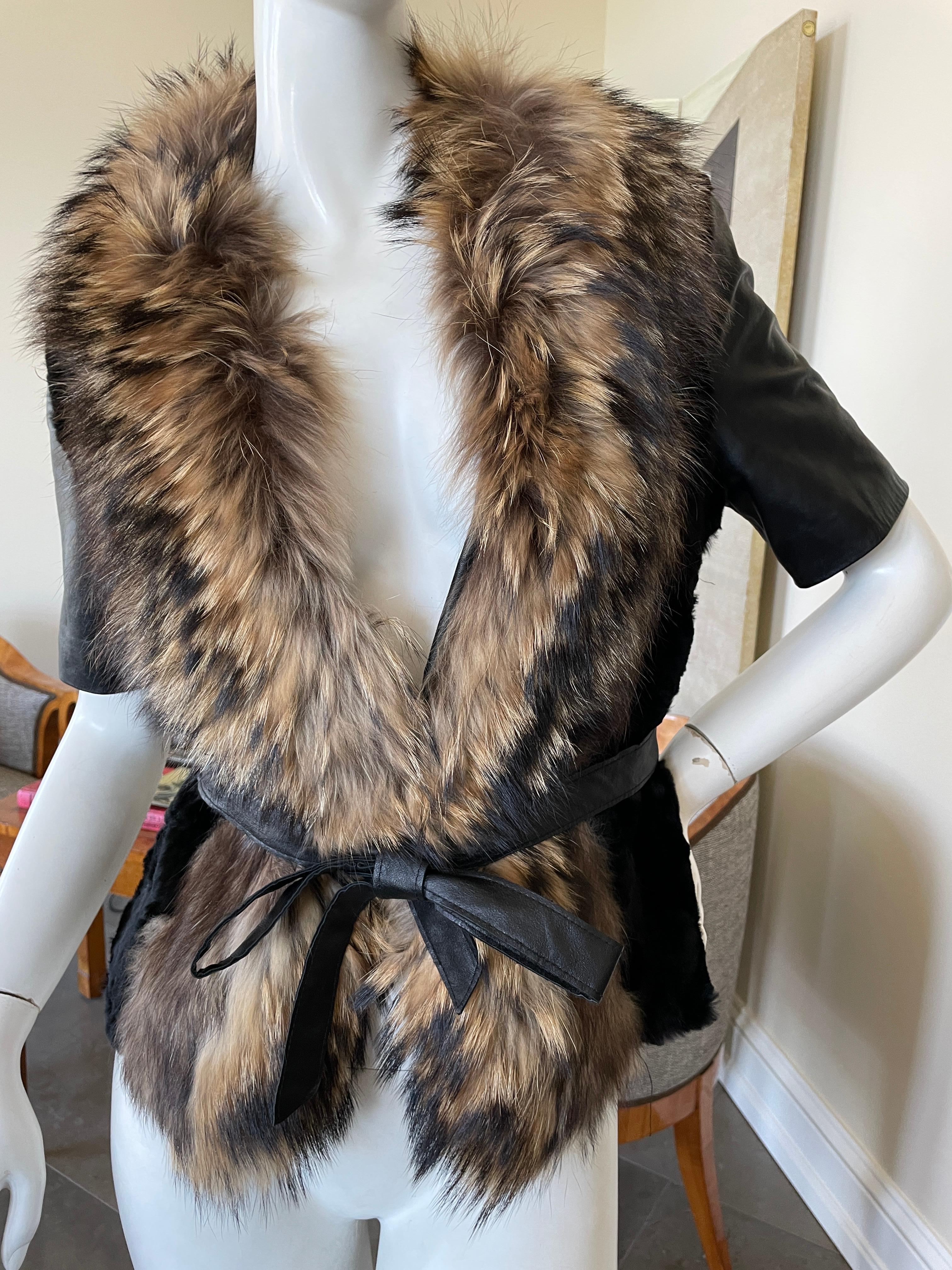 Roberto Cavalli Vintage Black Fur Short Jacket with Dramatic Fur Collar
Please use the zoom feature to see all the great details.
Size M-L there is no size label.
Bust 36