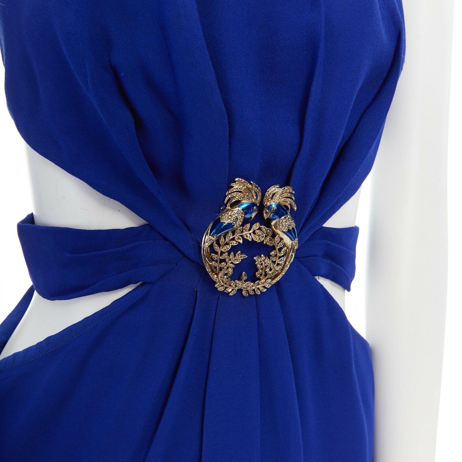 ROBERTO CAVALLI Vintage blue parrot enamel brooch cut out gown dress S 
Reference: CC/VAHI00095 
Brand: Roberto Cavalli 
Material: Viscose 
Color: Blue 
Pattern: Solid 
Extra Detail: Viscose blend. Electric blue. Round neck. Sleeveless. Gathered and