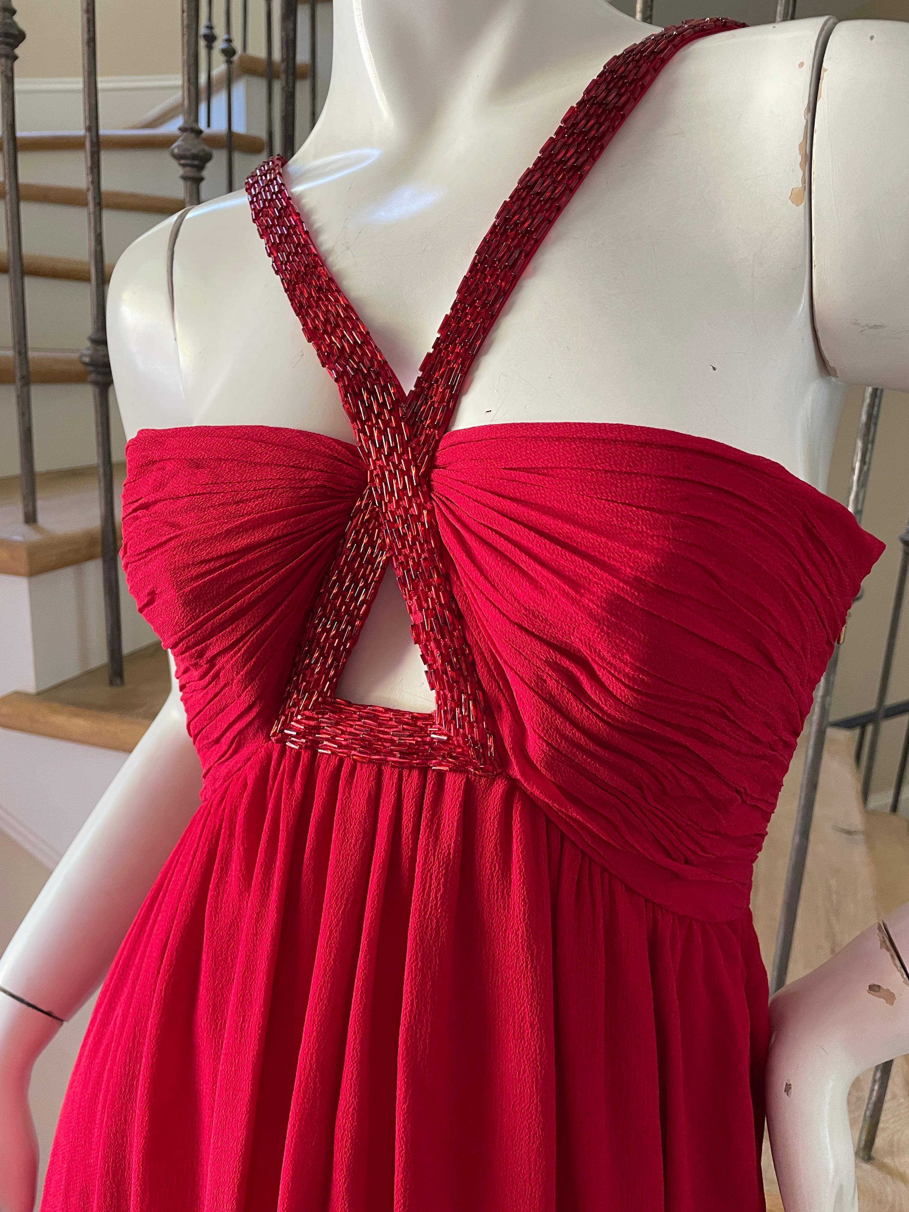 Roberto Cavalli Vintage Red Silk Evening Dress with Keyhole Beaded Details.
This is so petty, much better on .
Size 38-40 (fabric and size tags removed)
 Bust 34