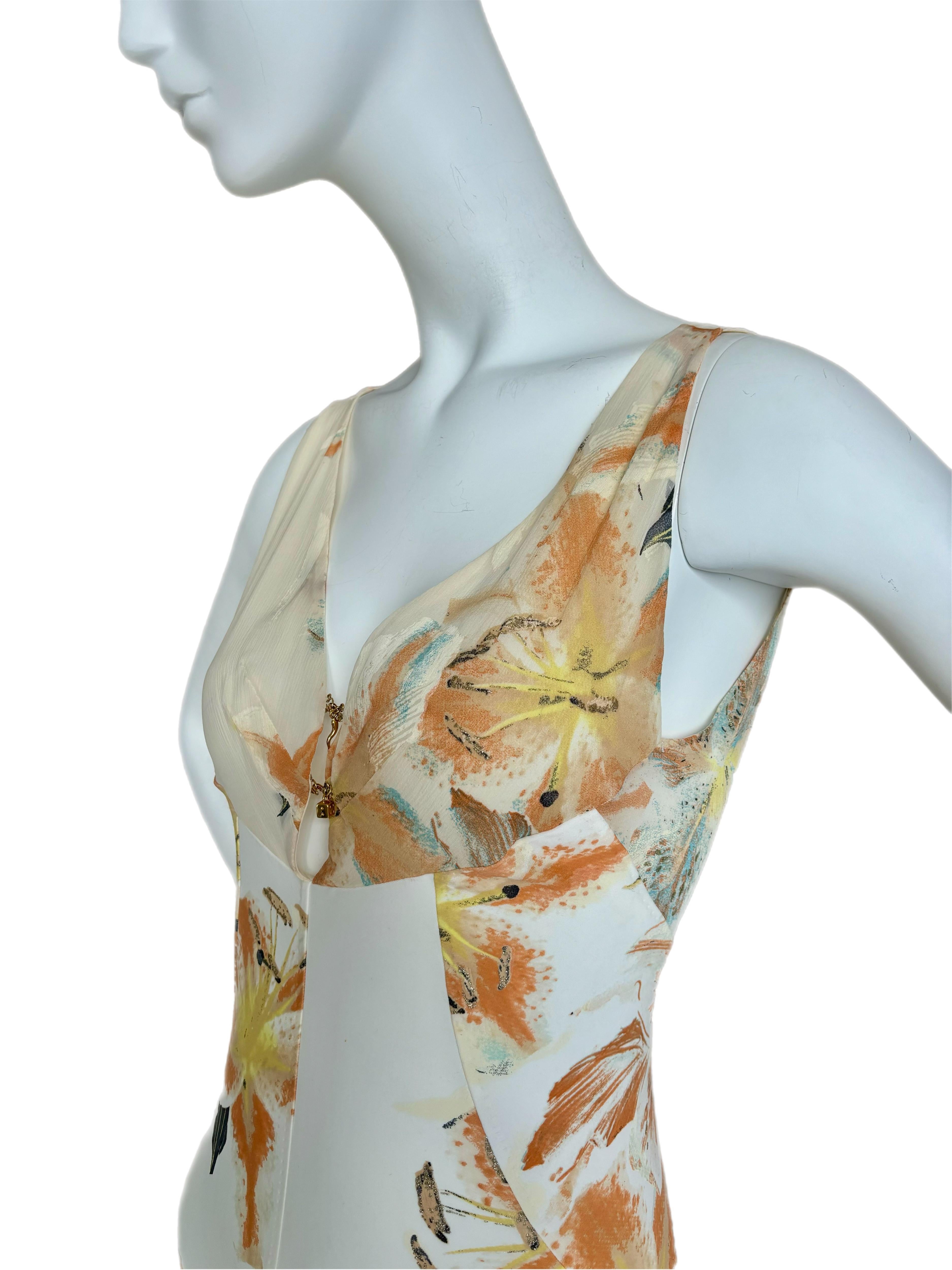 Roberto Cavalli
Vintage
Size M
Stretchy
Cute dice and pepper charms
Unique fit
Excellent condition, no flaws

Measurements in inches: length 41, pit to pit 15-16, waist 13-16

FINAL SALE