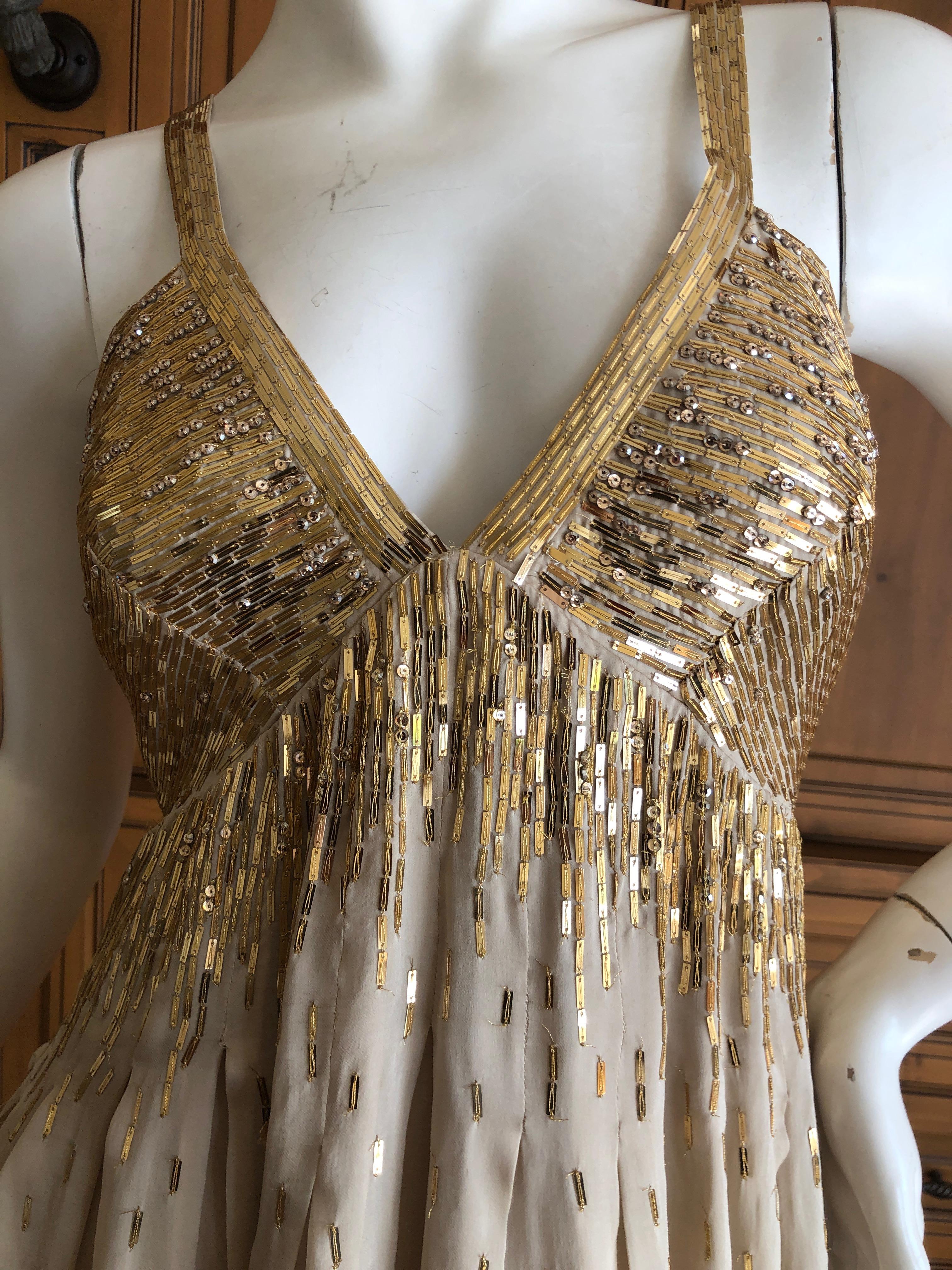 Roberto Cavalli Vintage Gold Silk Sequin Babydoll Mini Dress
This is stunning , but difficult to capture in photos.
Size 40
Bust 36