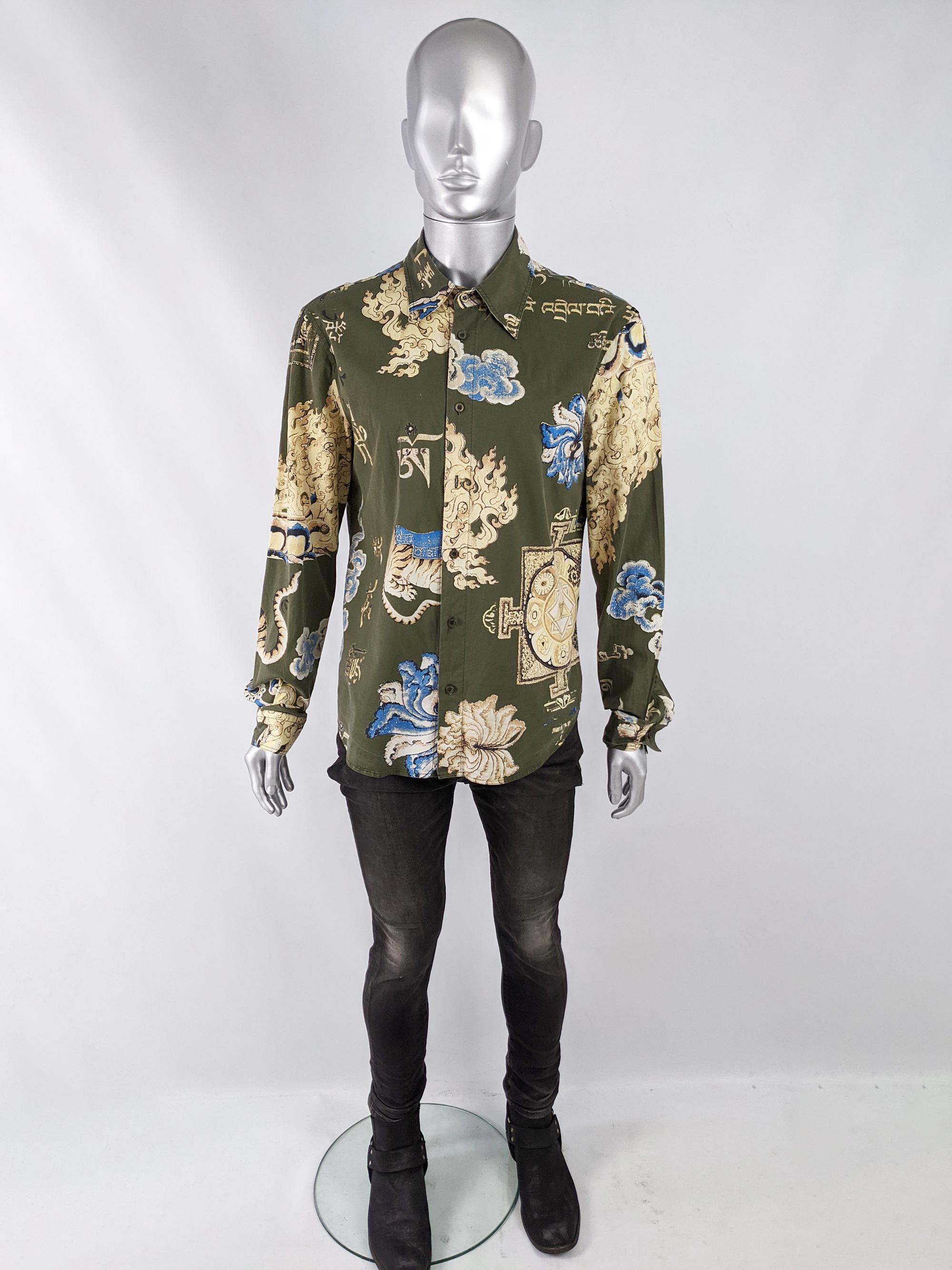 A stylish vintage mens long sleeve shirt from the late 90s / early 2000s by Roberto Cavalli for the Just Cavalli line.  In a green cotton with a blue and yellow Asian inspired all over print with gold printed in places throughout. 

Size: Marked