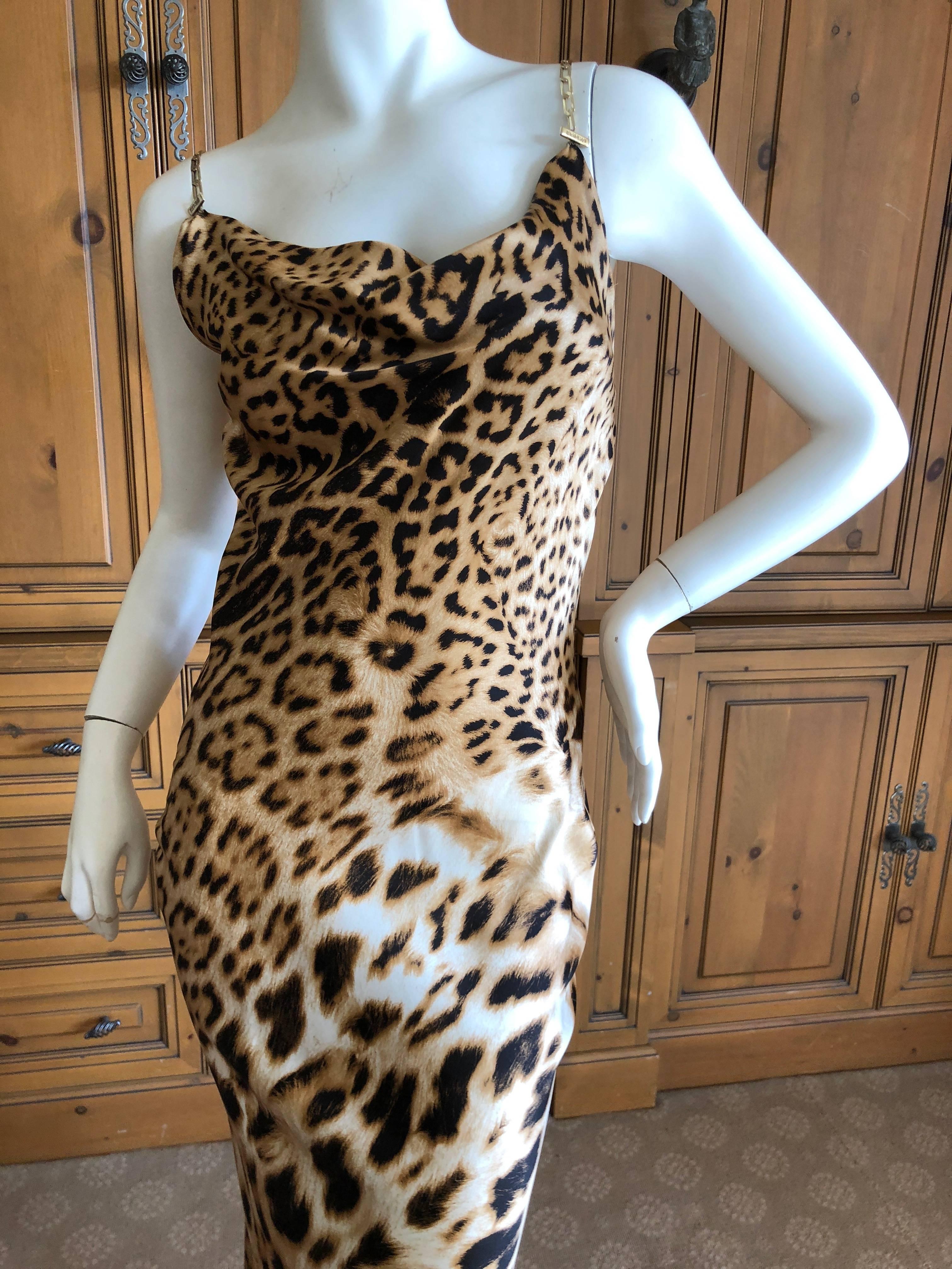 Roberto Cavalli Vintage Leopard Print Evening Dress with Gold Chain Straps
This is so pretty, and features gold chain straps.
Size Small
Bust  35