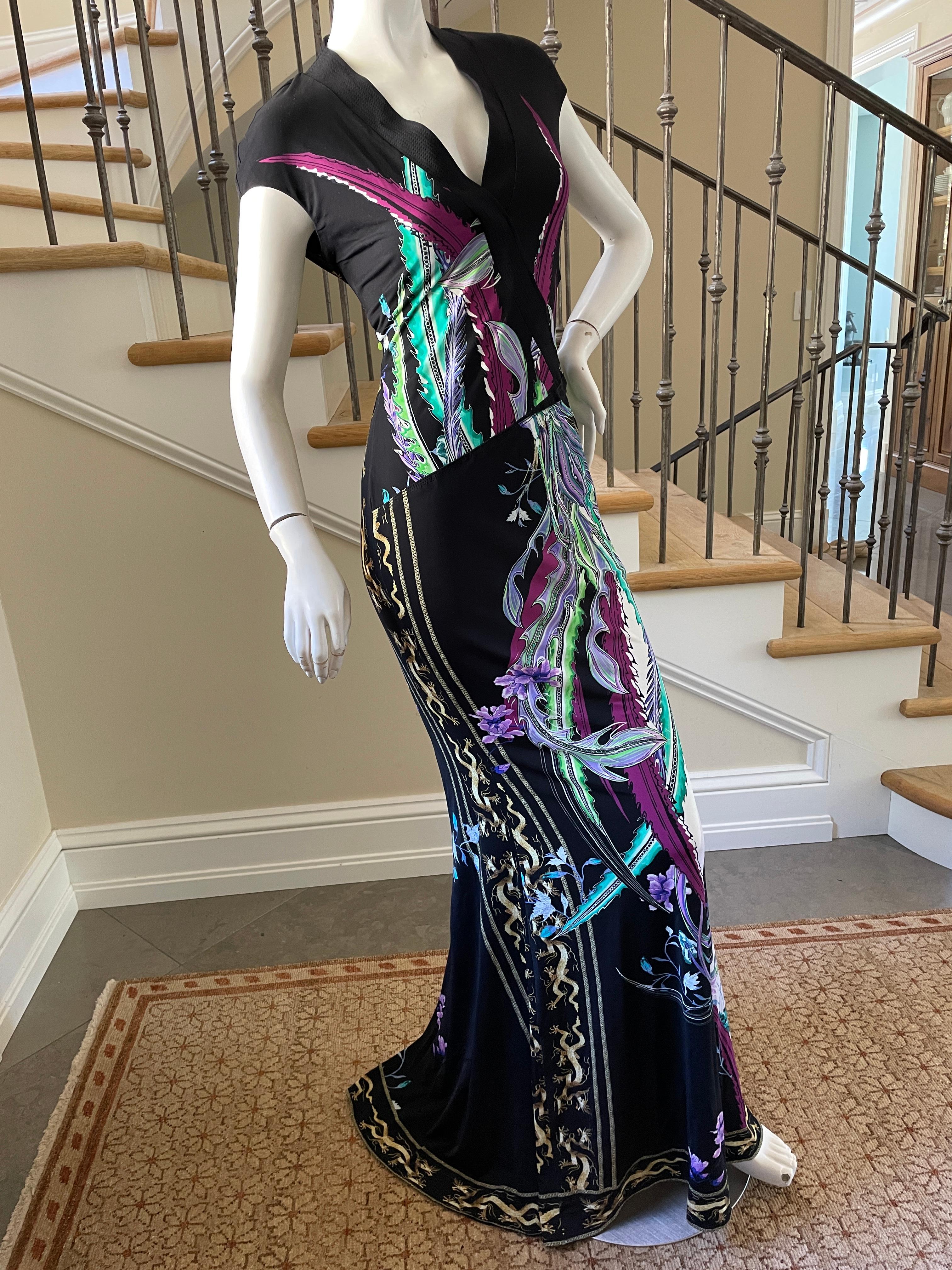 Roberto Cavalli Low Cut Bird Print Maxi Dress with Chinese Dragon Trim
Size 42, there is a lot of stretch.
Bust 38