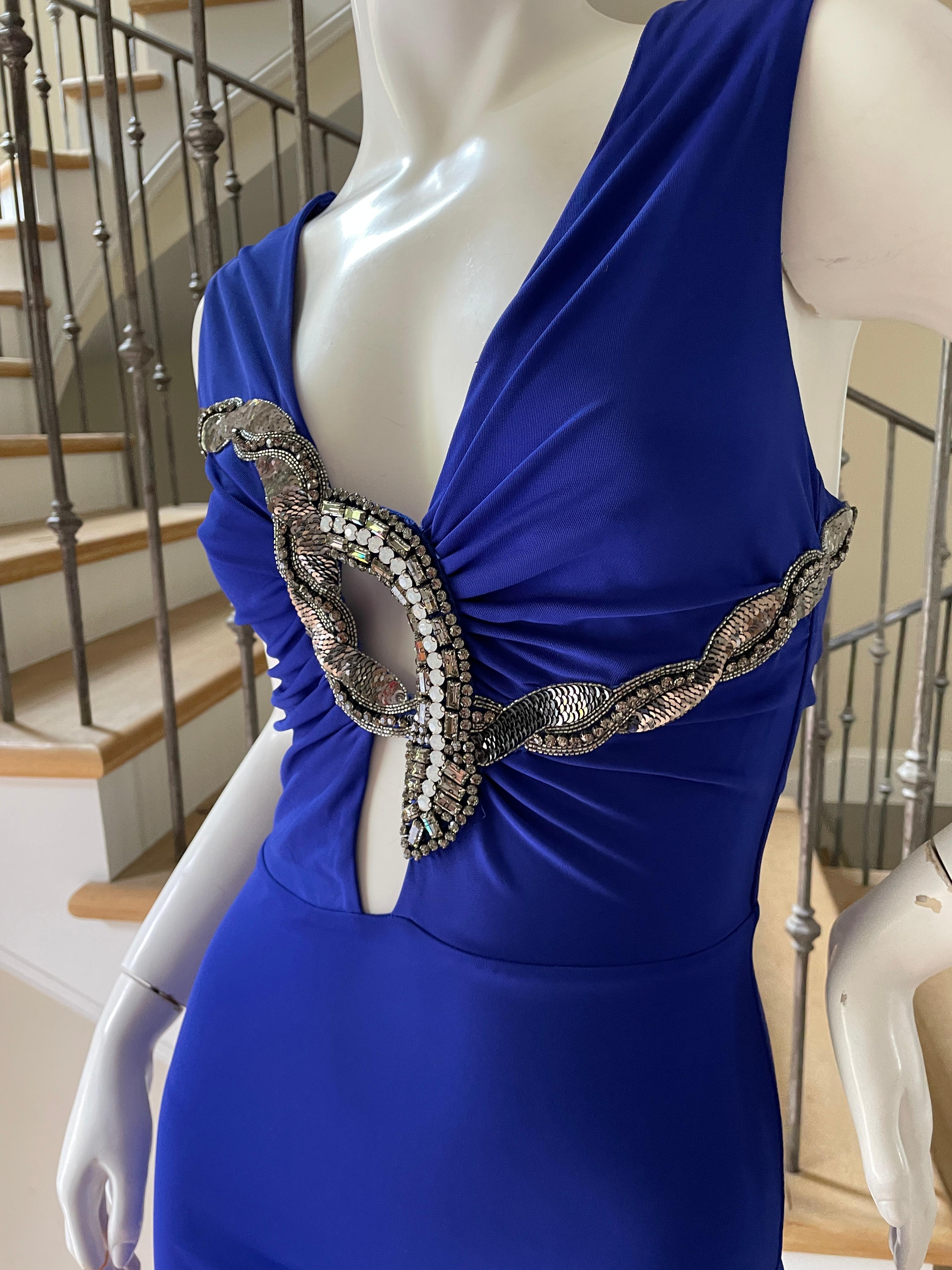 Roberto Cavalli Vintage Plunging Evening Dress with Jeweled Snake Embellishment.
This is so petty, much better on .
Size 38
 Bust 34