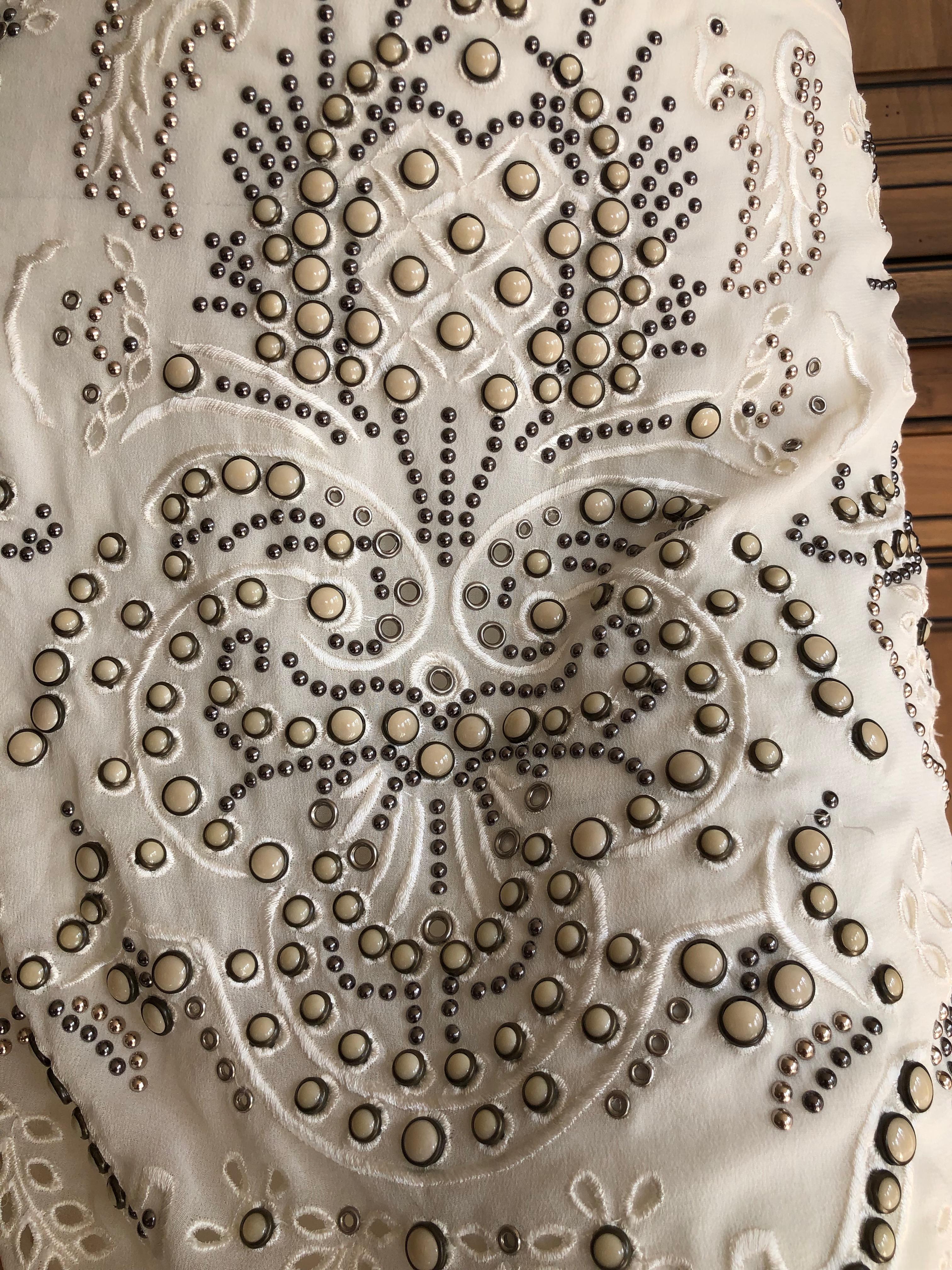 Roberto Cavalli Vintage Stud and Bezel Set Cabachon Embellished Skirt .
This is amazing, the hand work is incredible.
Please use the zoom feature to see the details
Size tag missing, it is a large or extra large, please check the measurements
Waist