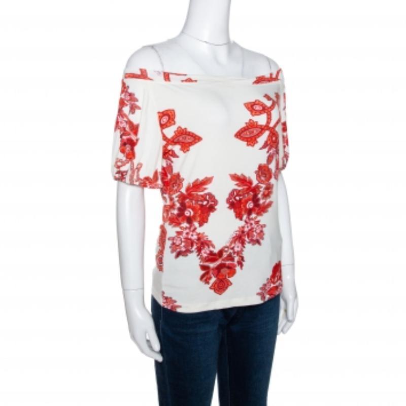 Perfect for fun summer outings with friends, this stylish Roberto Cavalli top is a must-have. It has been crafted from quality materials and comes in lovely hues of white & red. It has an off-shoulder style, floral print, short sleeves and a good